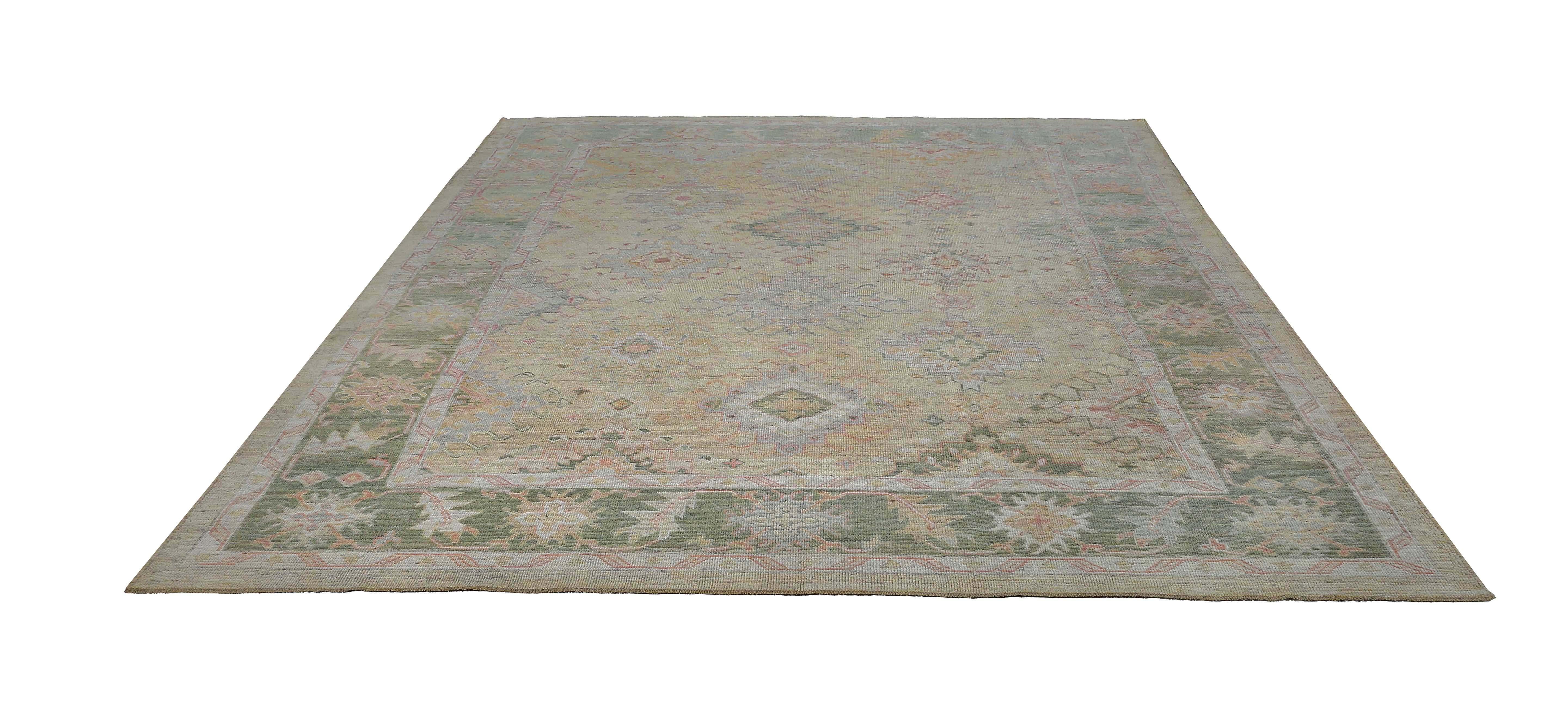 Hand-Woven Turkish Oushak Rug with Light Tones For Sale