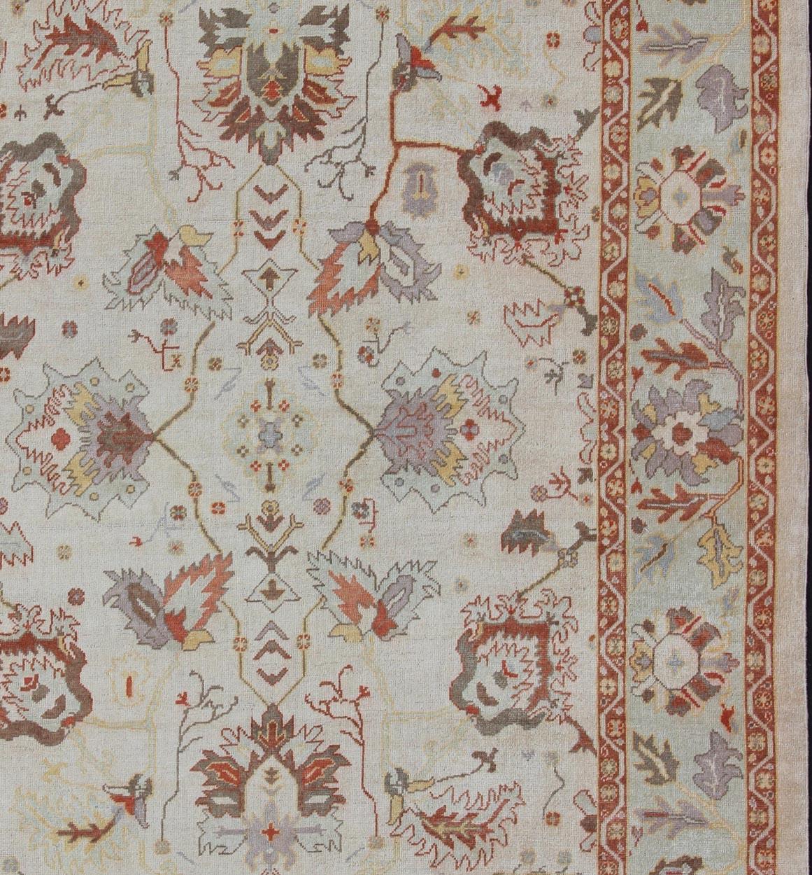 Turkish Oushak, Rug/ EN-649,  This classic Oushak rug from Turkey features a colorful palette and an all-over design of floral shapes, surrounded beautifully by an all-encompassing, complementary border. This piece is very versatile and will