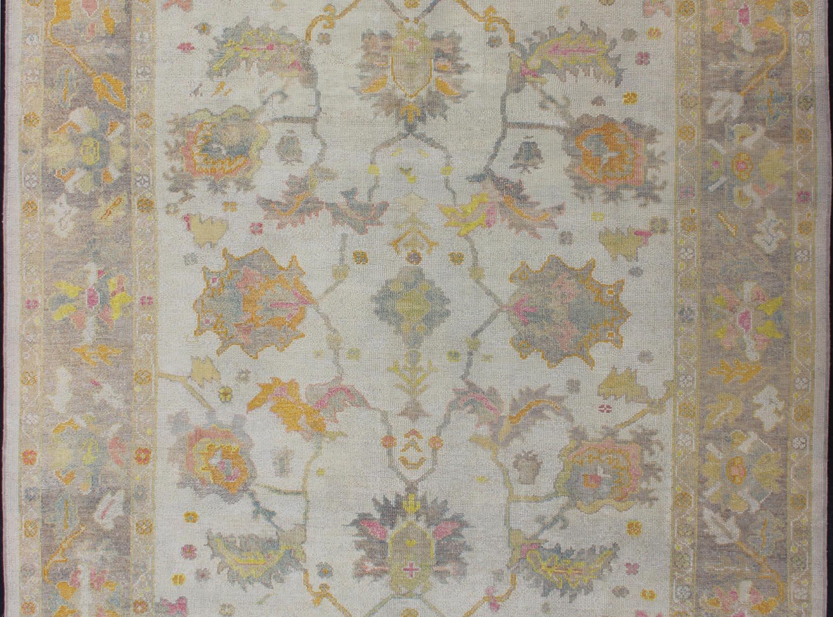 Turkish Oushak Rug with Muted Color Palette and All-Over Flower Design In New Condition For Sale In Atlanta, GA