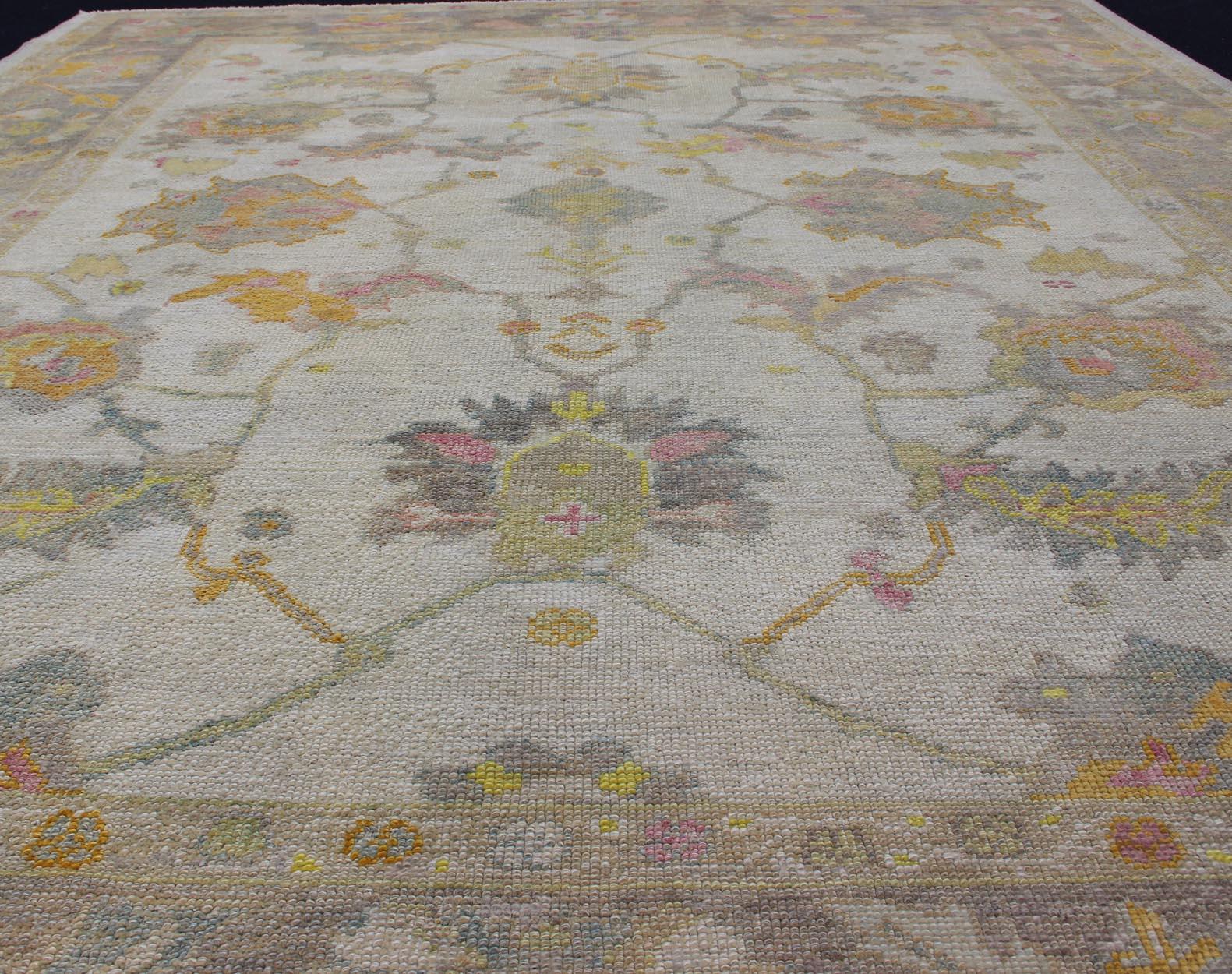 Turkish Oushak Rug with Muted Color Palette and All-Over Flower Design For Sale 1