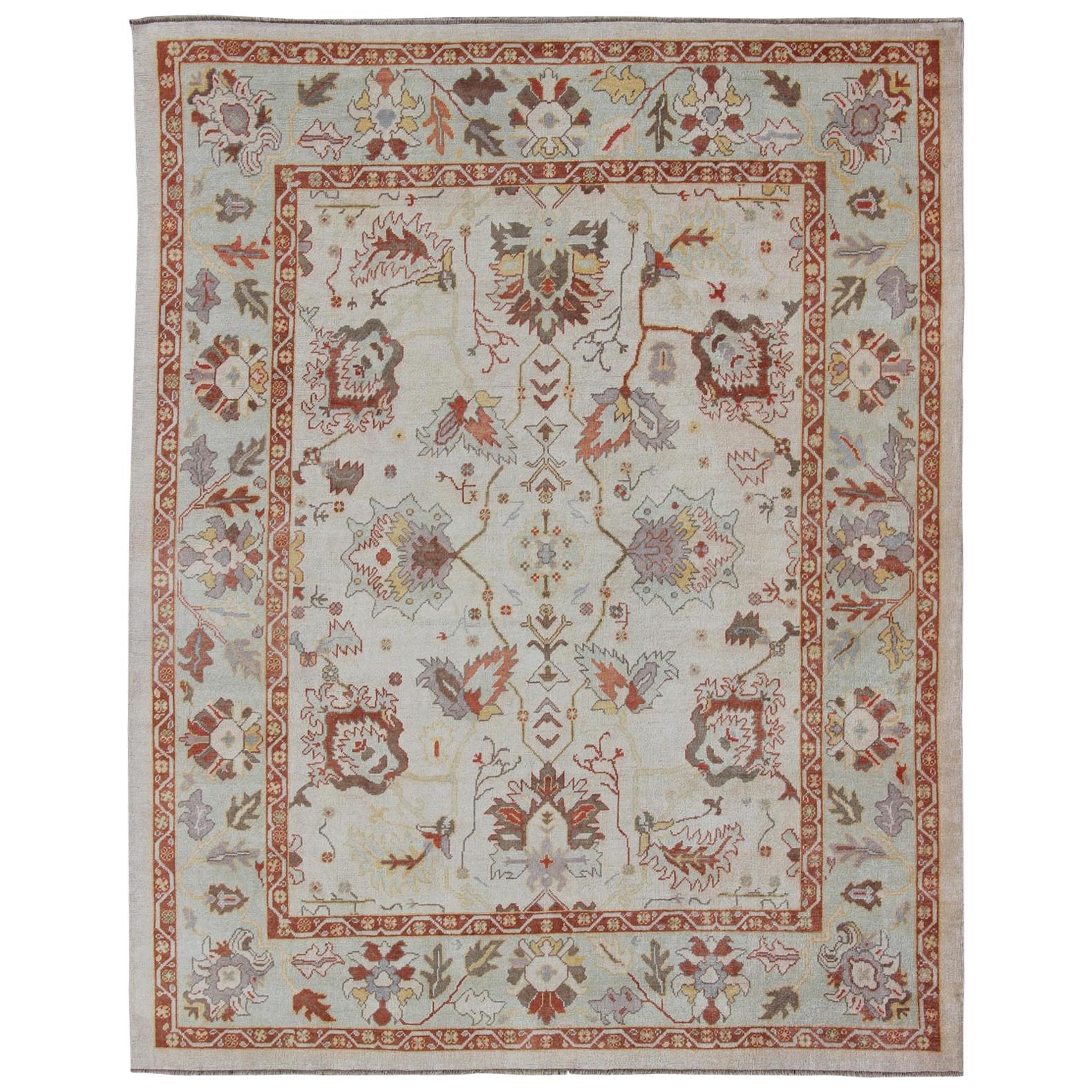 Turkish Oushak Rug with Muted Color Palette and All-Over Flower Design For Sale