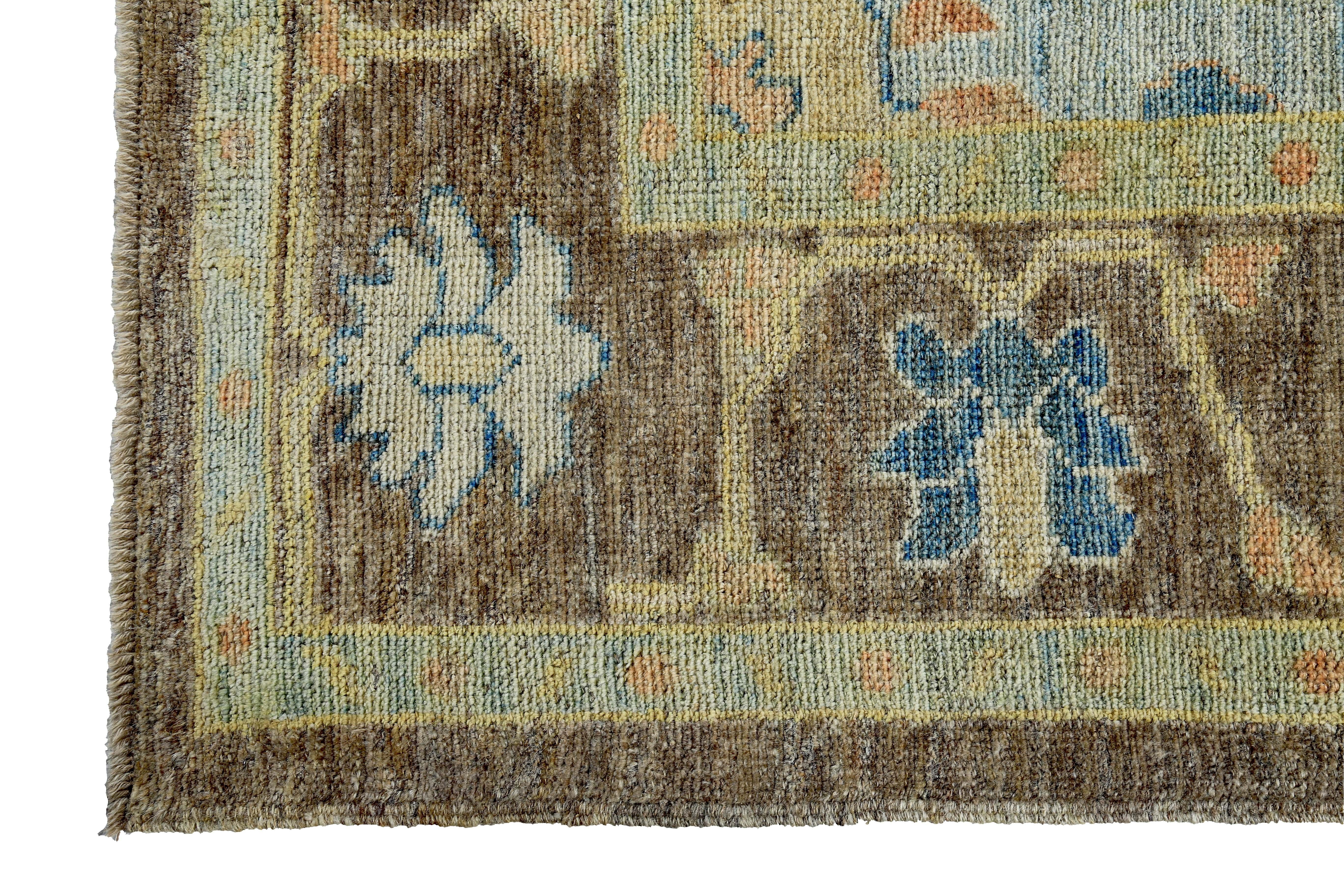 Contemporary Turkish Oushak Rug with Navy and Ivory Flower Heads on Brown Field For Sale