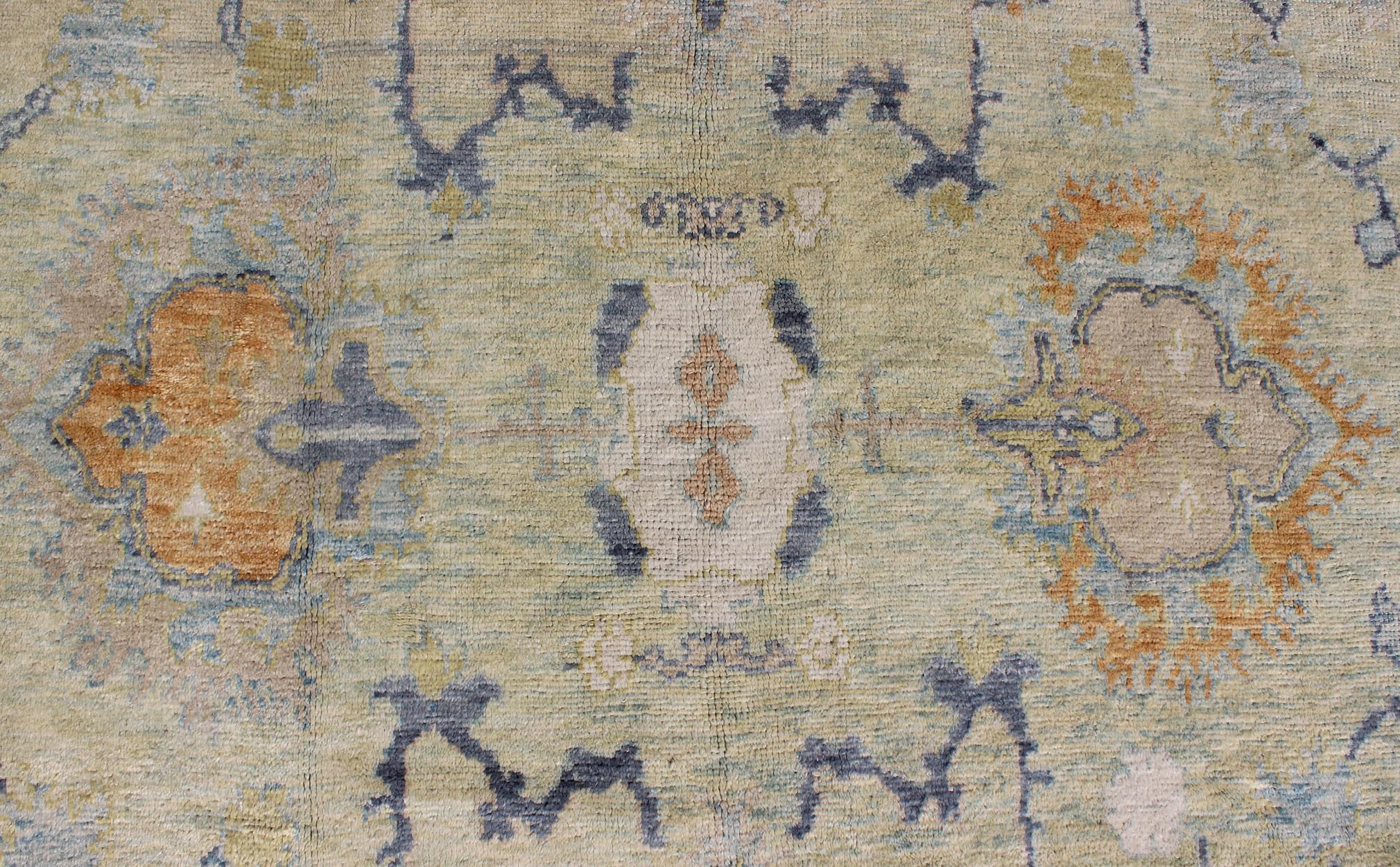 Contemporary Turkish Oushak Rug with Neutral Color Palette and All-Over Flower Design For Sale