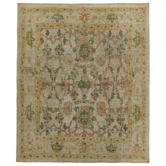 Turkish Oushak Rug with Orange and Green Flower Heads on Beige Field