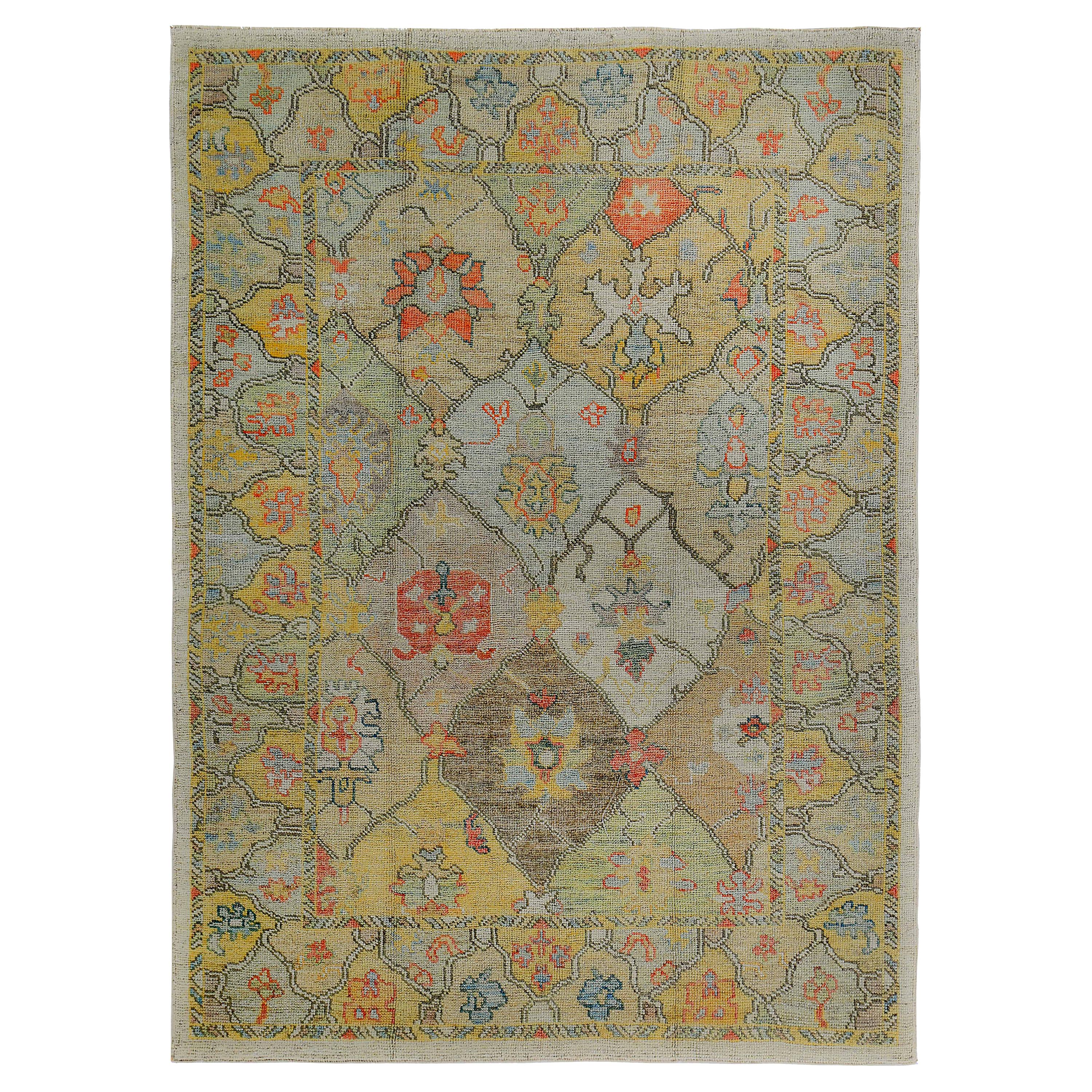Turkish Oushak Rug with Orange and Yellow Floral Details on Ivory Field For Sale