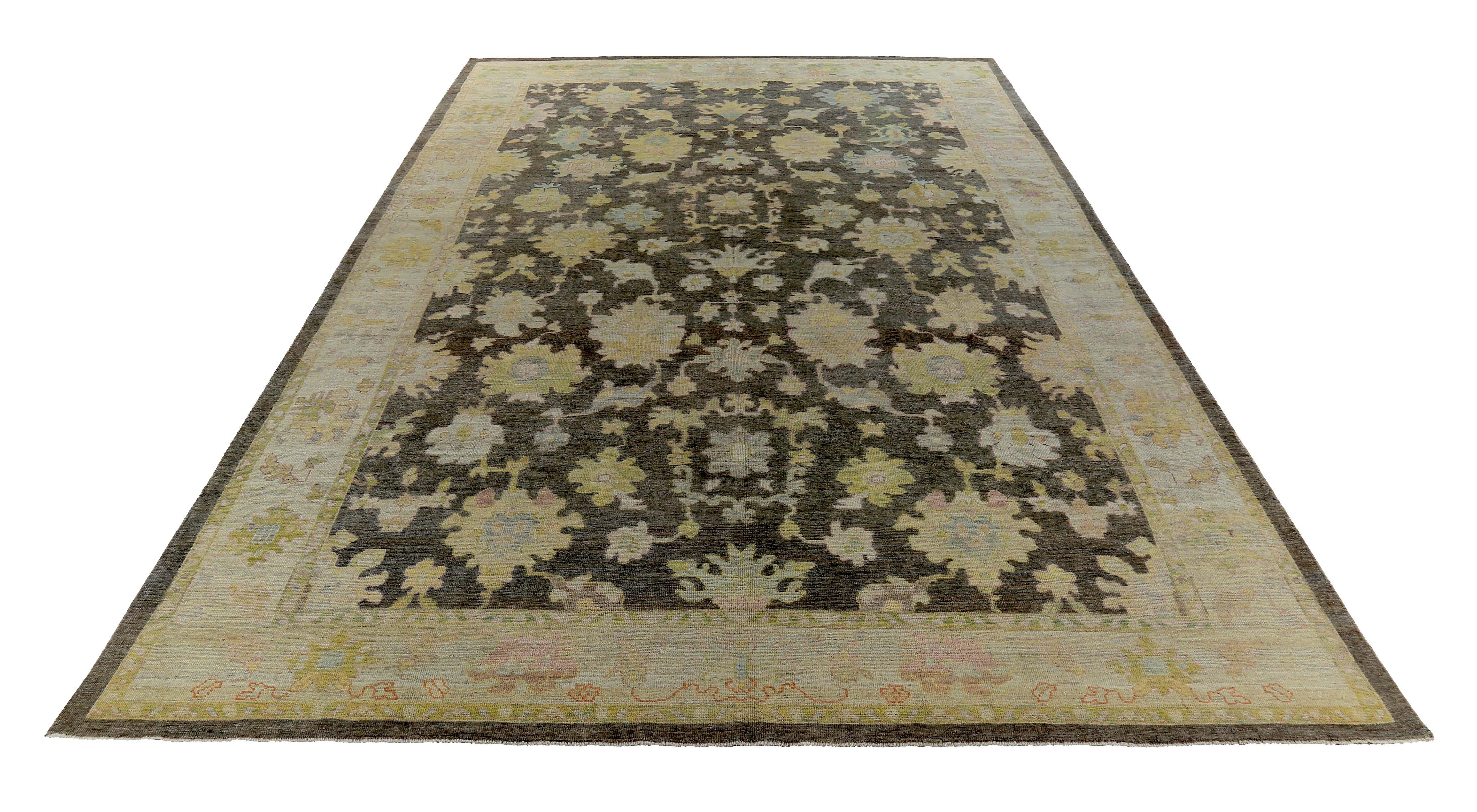 Turkish rug made of handwoven sheep’s wool of the finest quality. It’s colored with organic vegetable dyes that are certified safe for humans and pets alike. It features gold, pink and blue floral details on a lovely ivory and brown field. Flower