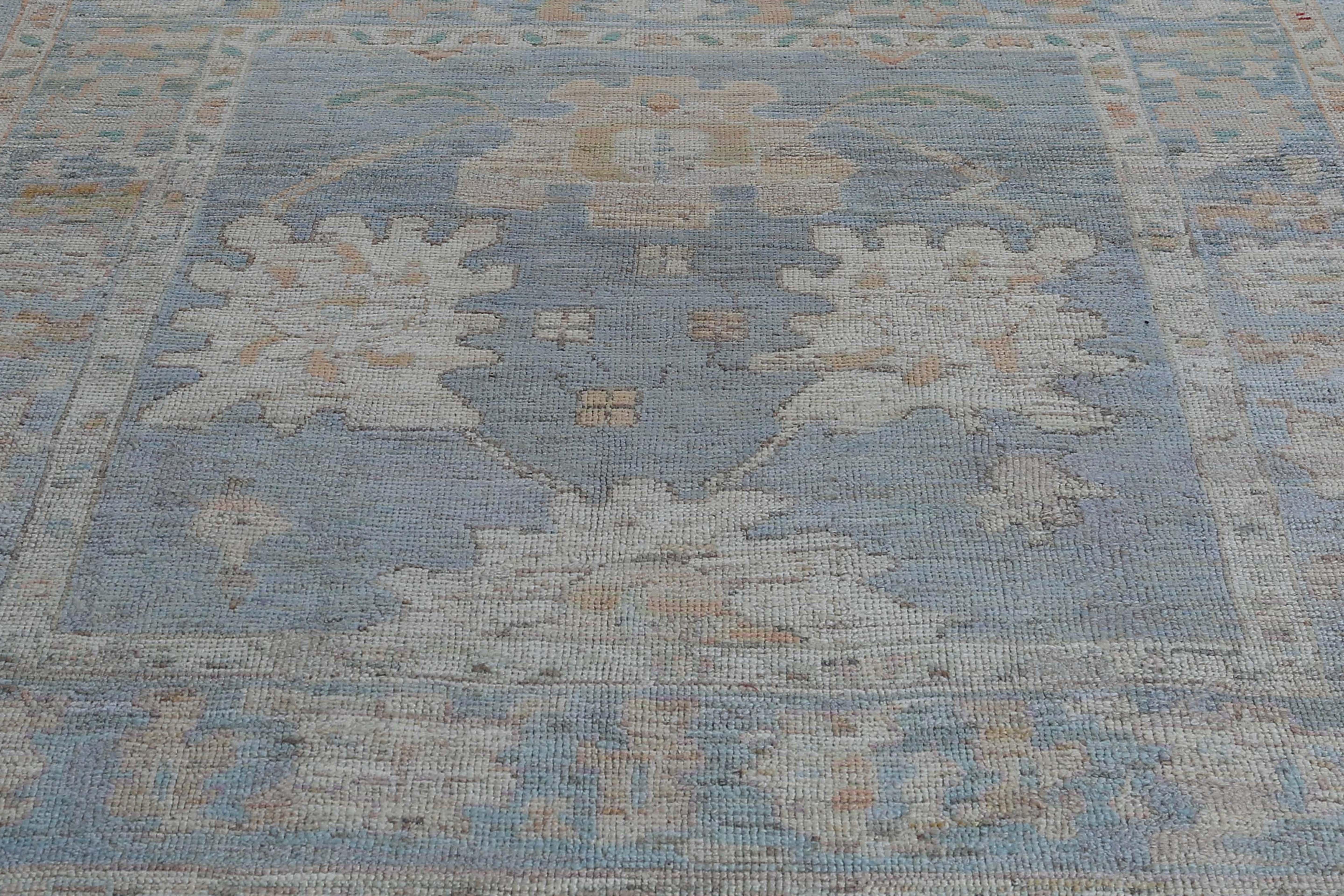 Wool Turkish Oushak Rug with Rich Background For Sale