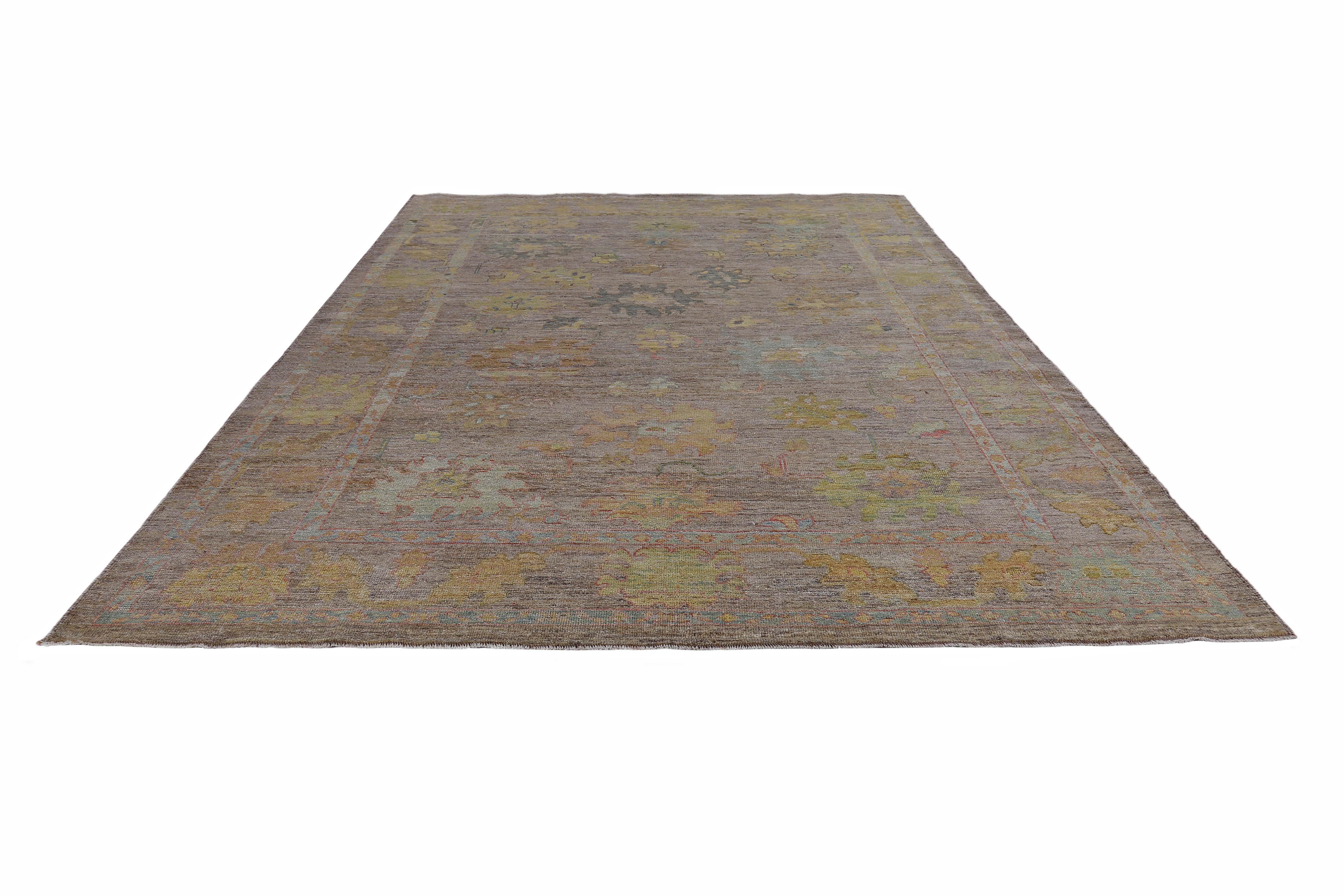 Turkish rug made of handwoven sheep’s wool of the finest quality. It’s colored with organic vegetable dyes that are certified safe for humans and pets alike. It features yellow, blue and green flower heads on a beautiful brown field. Flower patterns