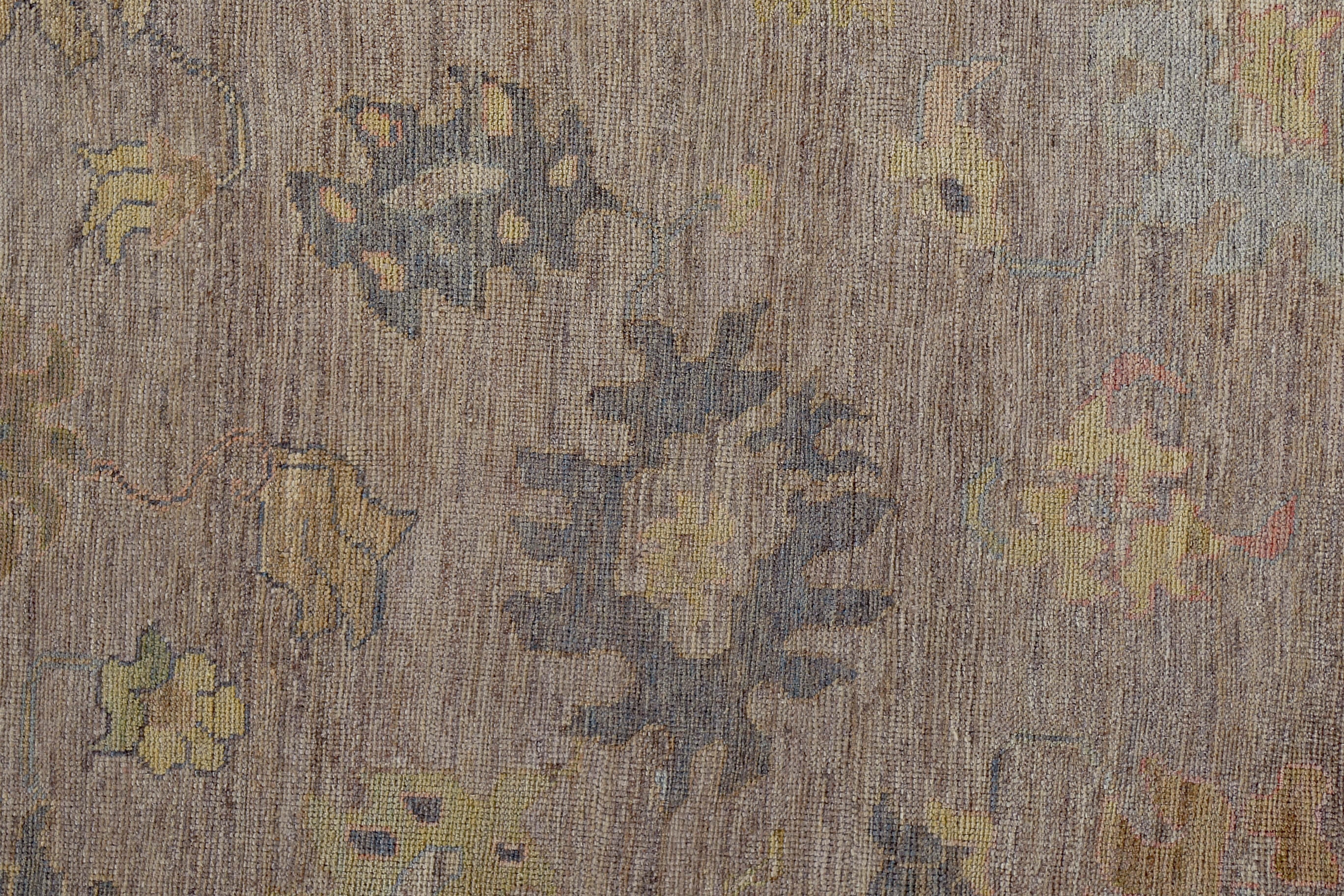 Hand-Woven Turkish Oushak Rug with Yellow, Blue and Green Flower Heads on Brown Field For Sale