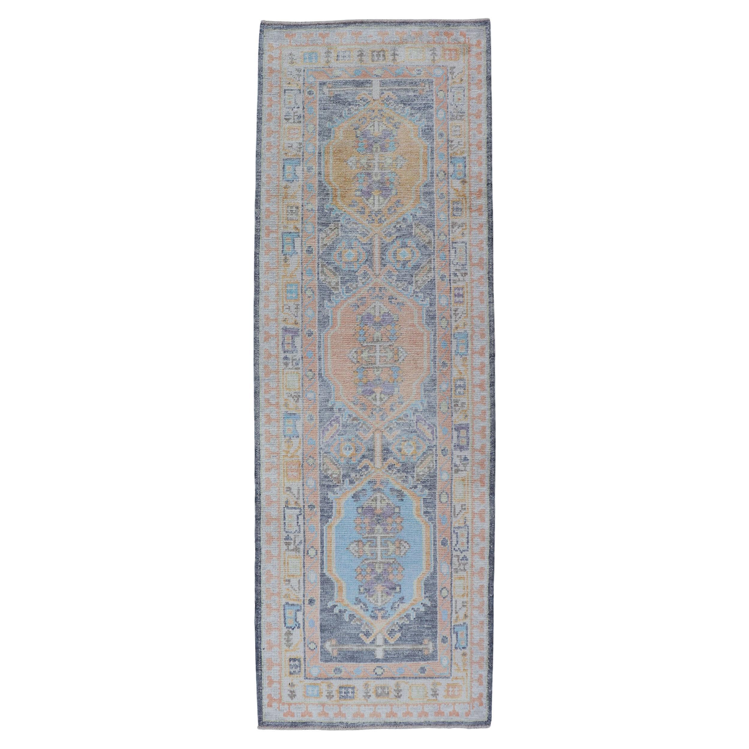 Turkish Oushak Runner in Powder Blue, Peach, and Gold 2
7 x 8
1