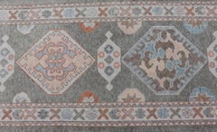 Turkish Oushak Runner in Soft Coral, Slate Gray, and Ivory with Geometric Design