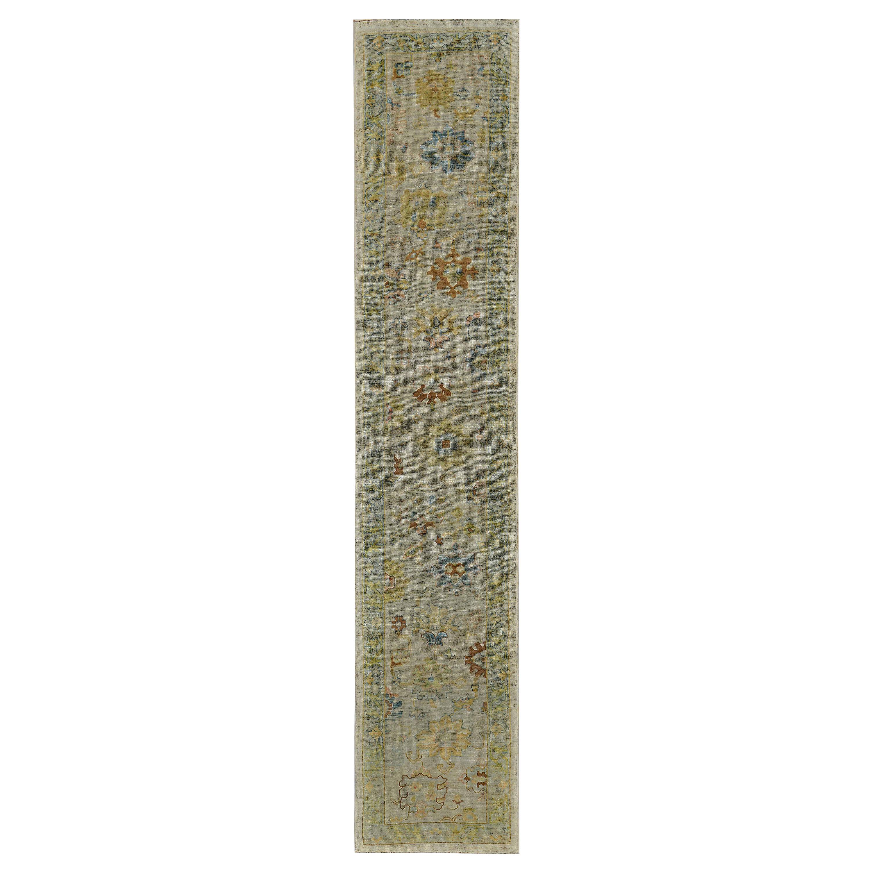 Turkish Oushak Runner Rug with Blue and Brown Floral Details on Ivory Field For Sale