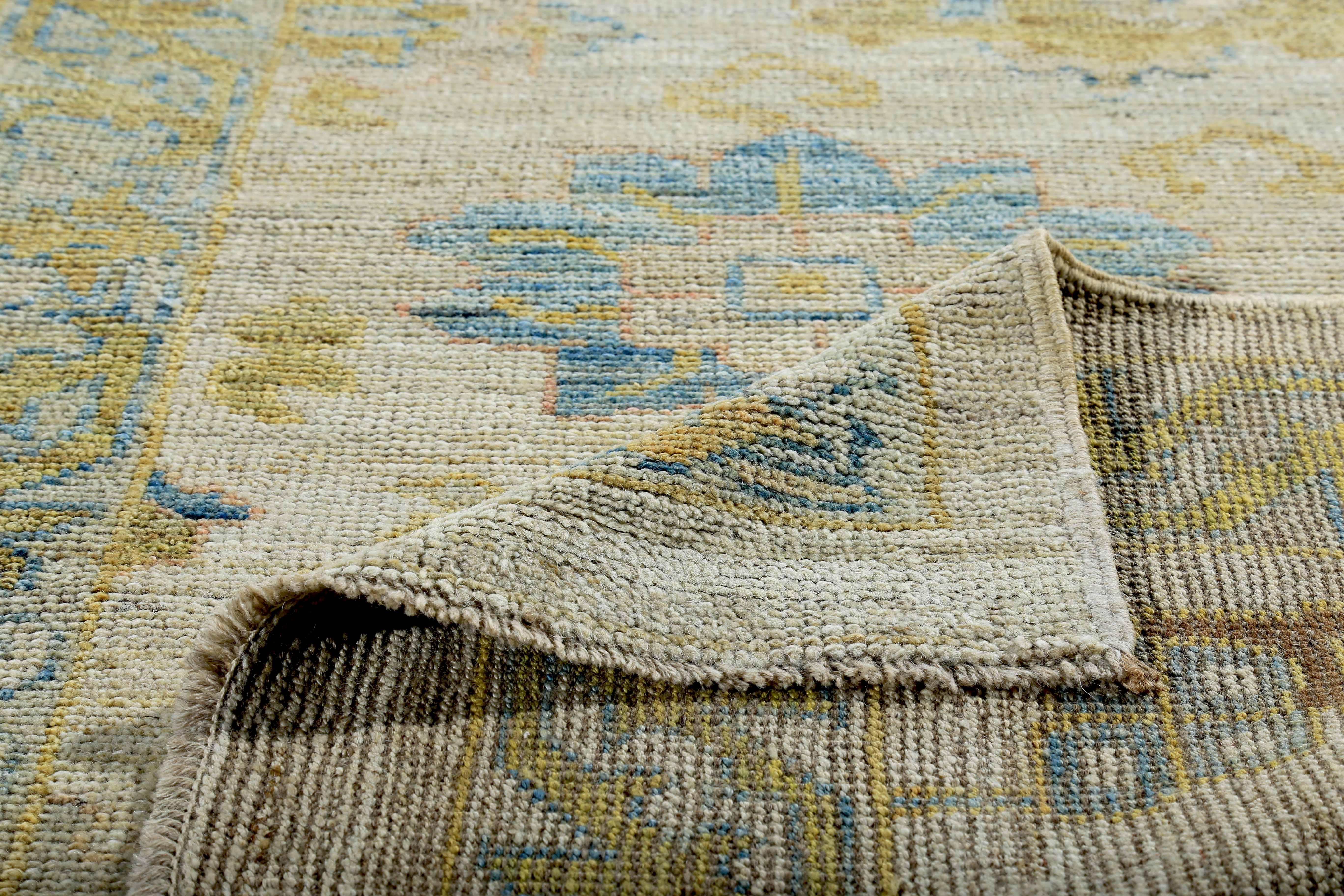 Wool Turkish Oushak Runner Rug with Blue and Brown Floral Details on Ivory Field For Sale
