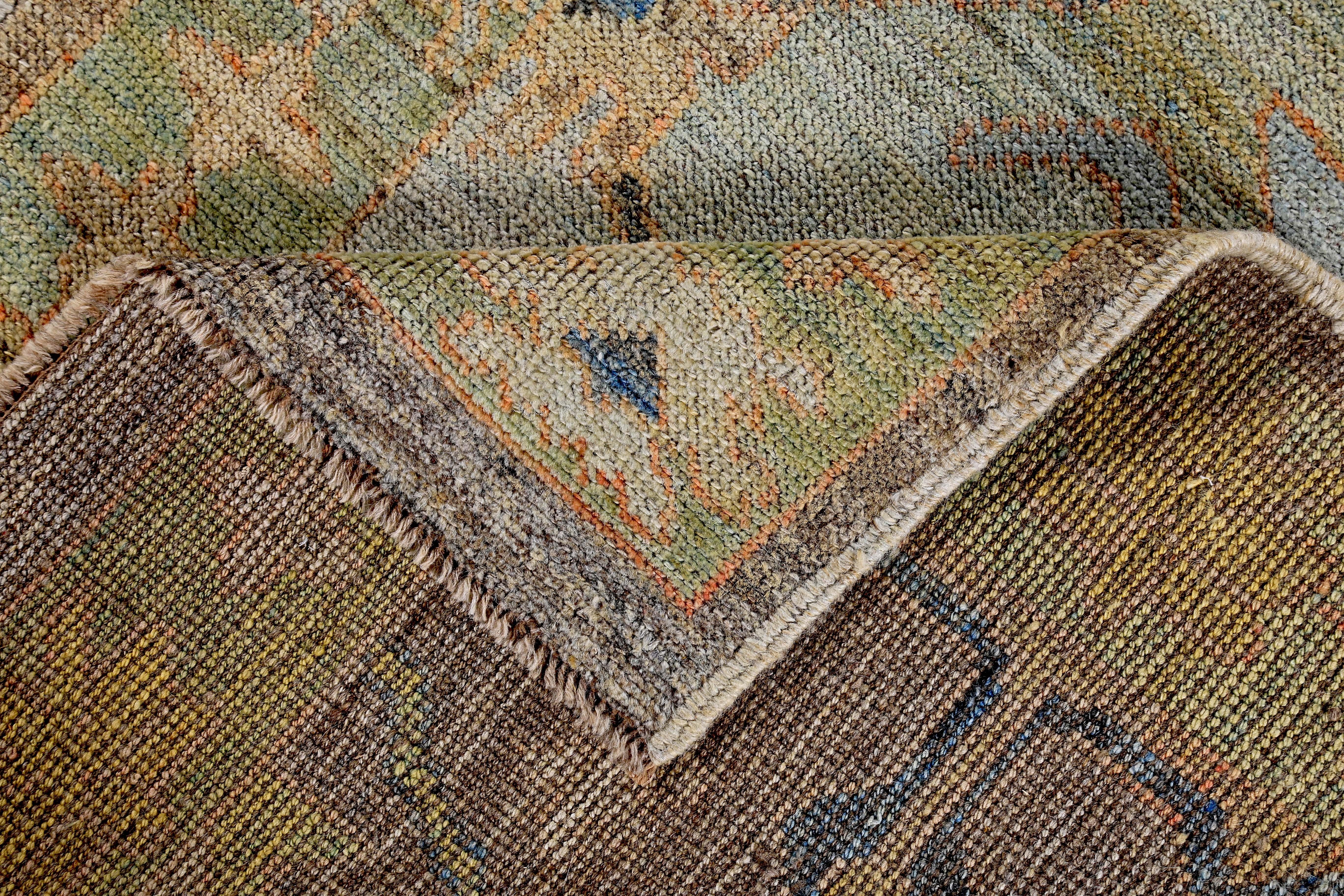 Turkish Oushak Runner Rug with Blue Floral Patterns on Brown and Green Field For Sale 1
