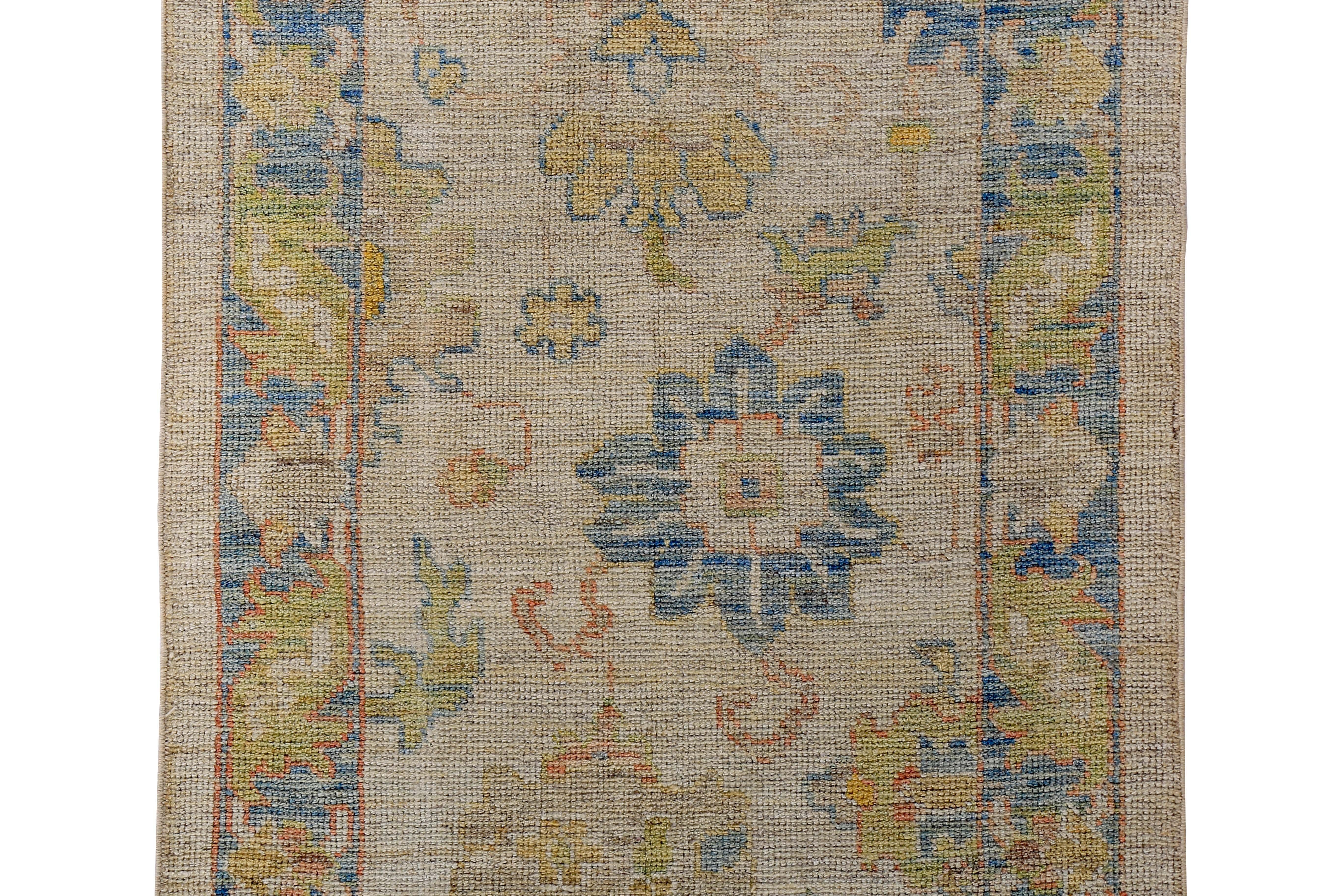 Hand-Woven Turkish Oushak Runner Rug with Blue and Green Floral Patterns on Ivory Field For Sale