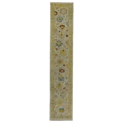 Turkish Oushak Runner Rug with Brown and Blue Floral Details on Ivory Field