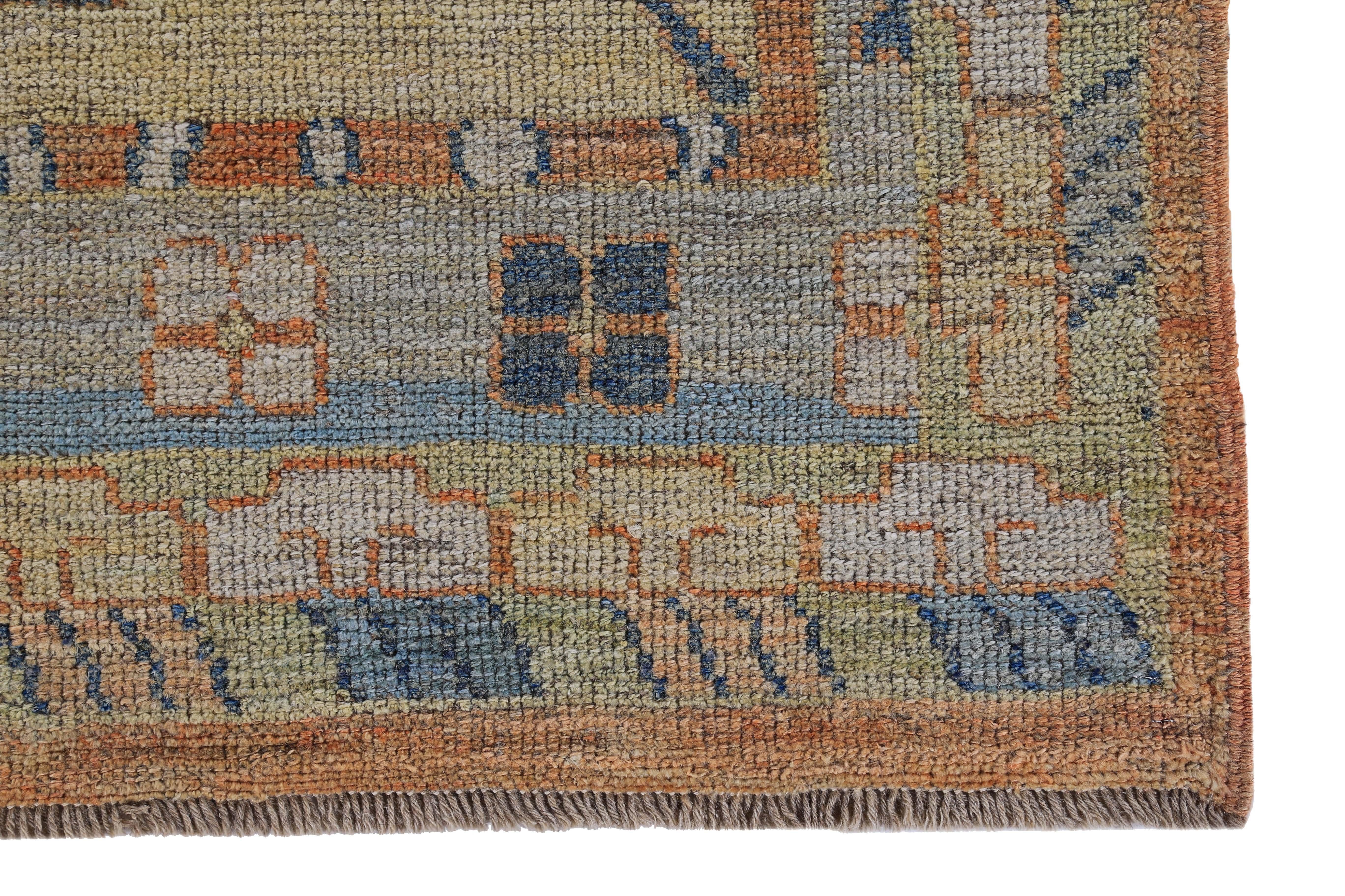 Hand-Woven Turkish Oushak Runner Rug with Navy & Green Floral Patterns on Blue & Orange Fie For Sale