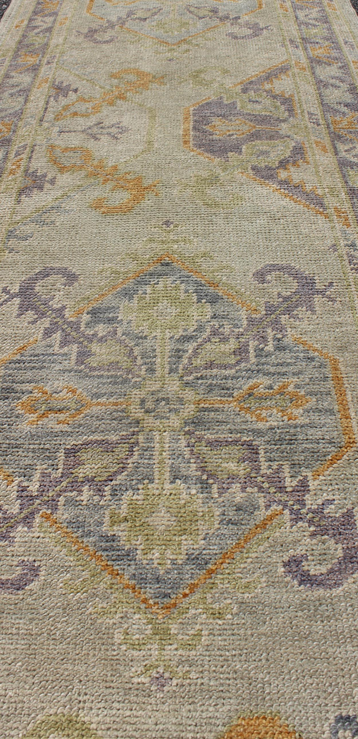 Wool Turkish Oushak Runner with a Tribal Design in Purple, Blue and L.Green Colors  For Sale