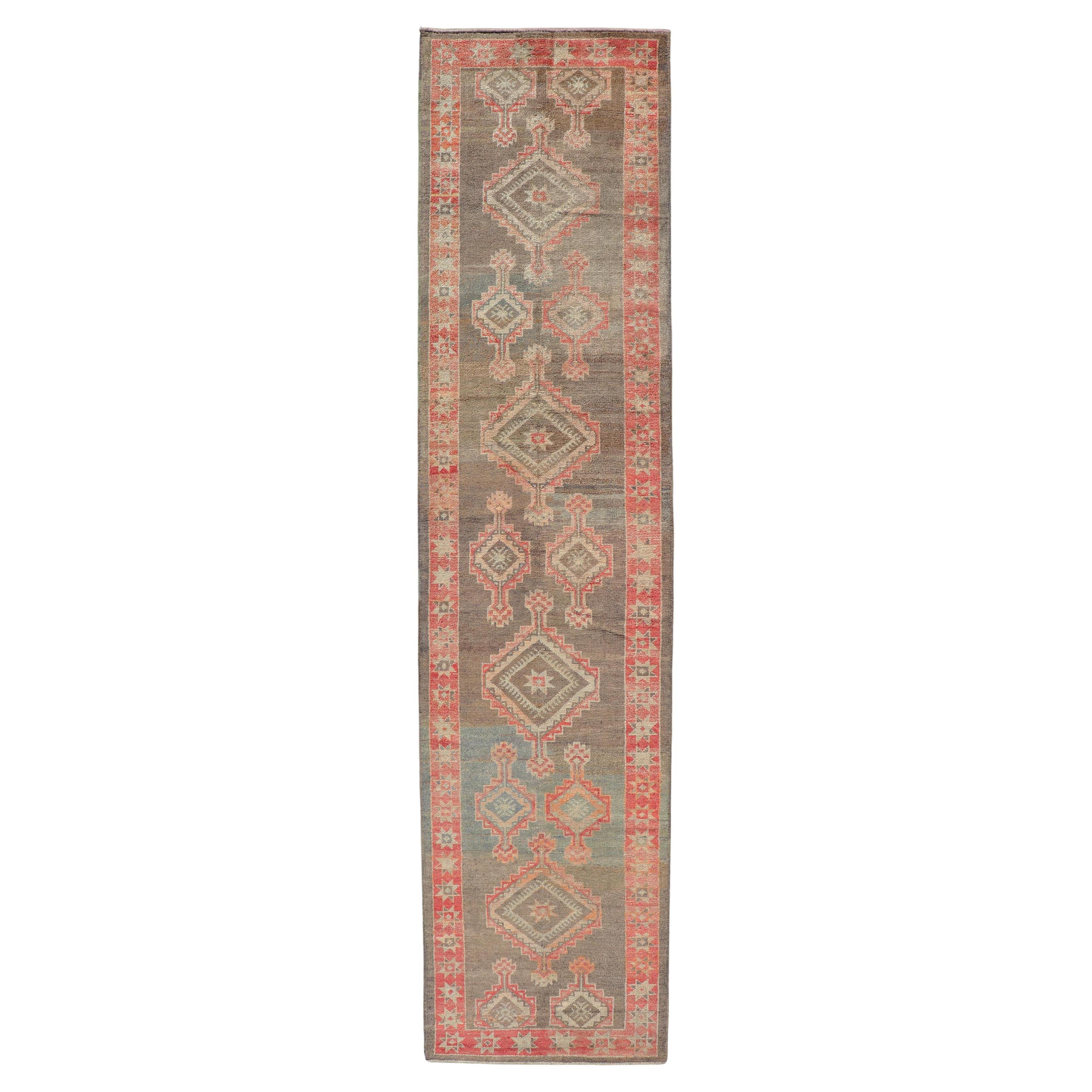 Turkish Oushak Runner with Coral Red and Taupe Geometric Medallion Design