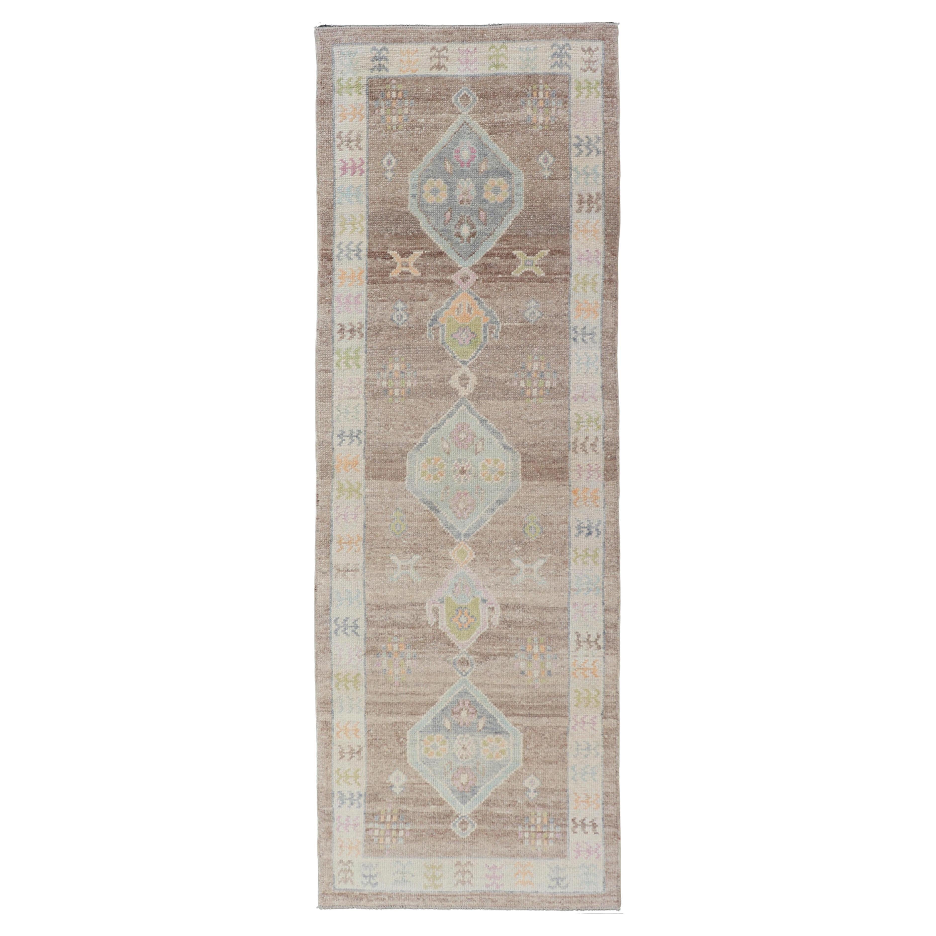 Turkish Oushak Runner with Soft Brown Field and Pale Blue Geometric Medallions