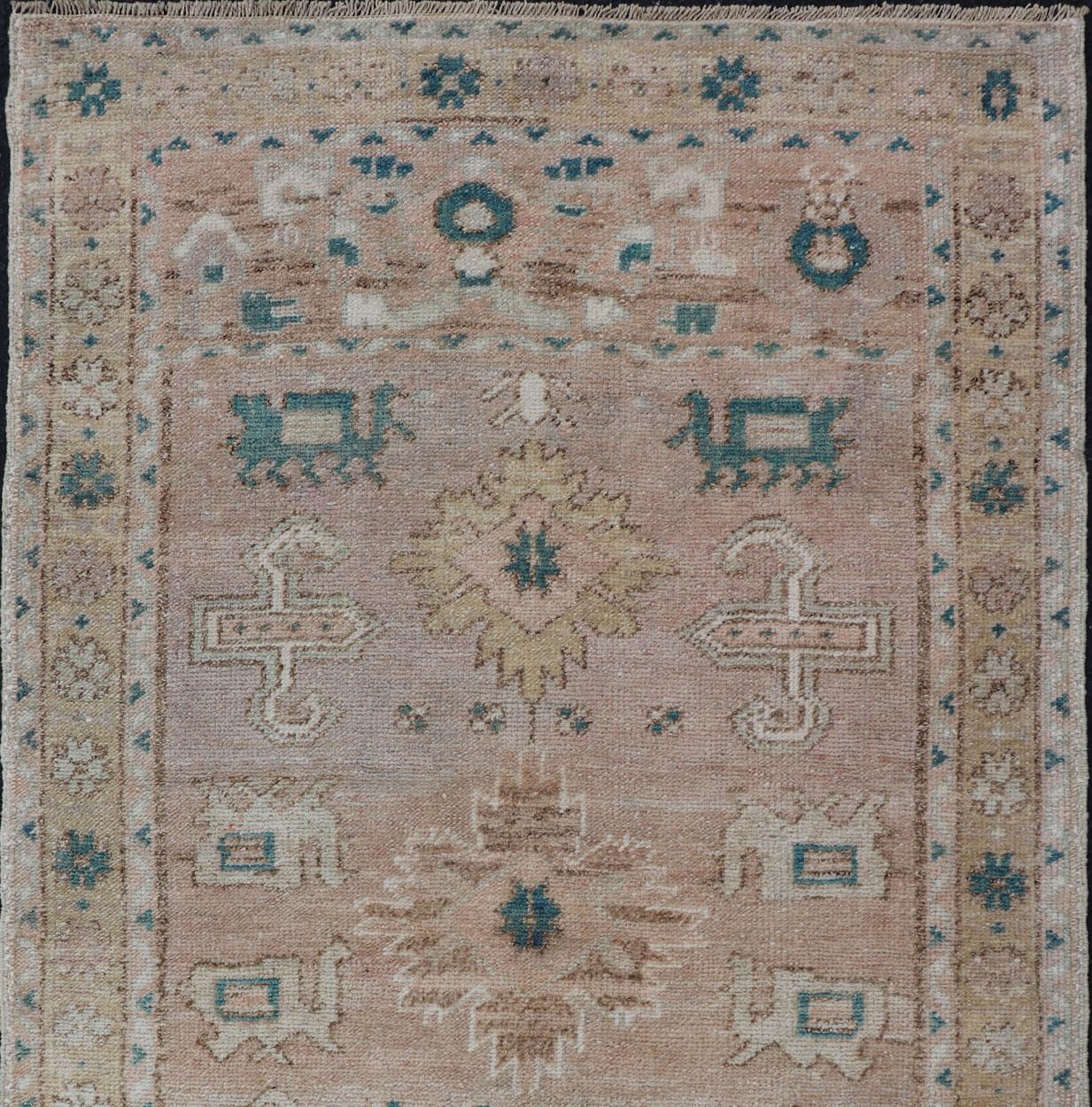 Measures: 2'5 x 4'2 
Turkish Oushak Vintage in variation of Muted Colors, tan, pink, teal & Lt. Brown. 
Vintage Turkish Oushak rug in taupe, tan, blush, light pink, teal, light brown and soft yellow. Keivan Woven Arts/rug EN-2541, country of origin