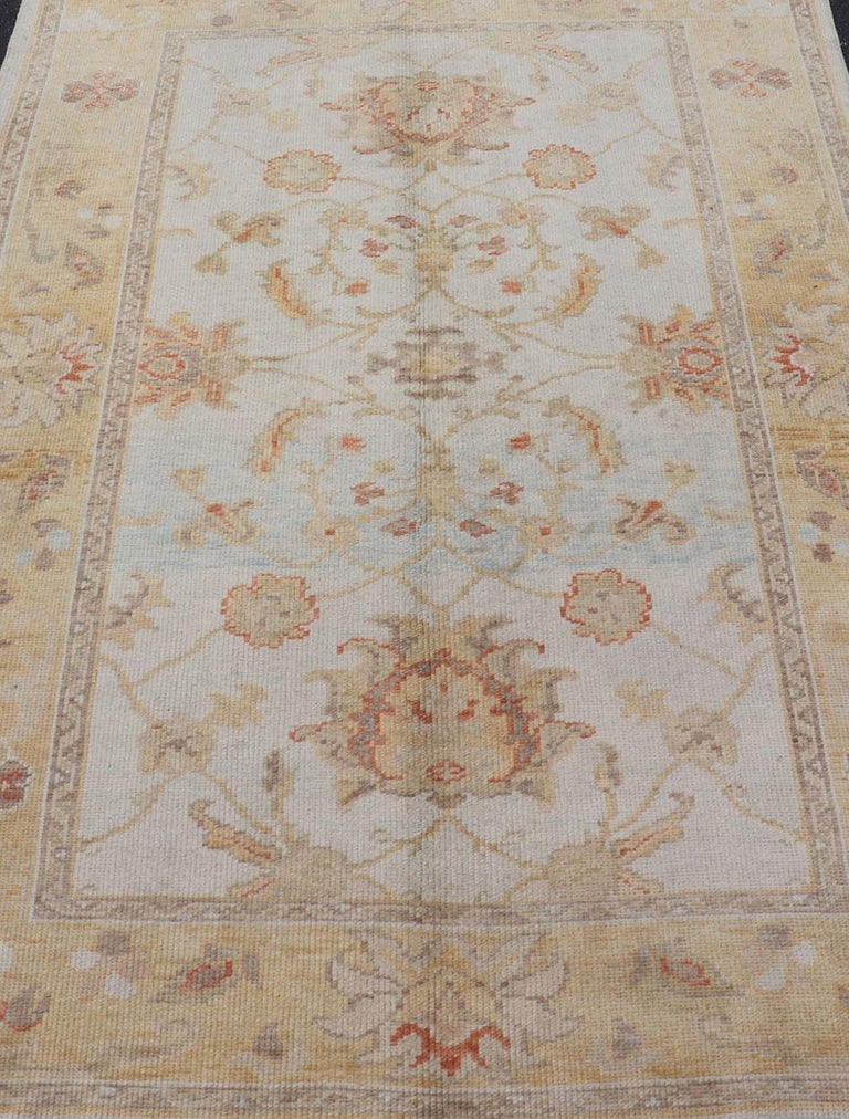 20th Century Turkish Oushak Vintage Rug in Cream, Yellow, Blue and Orange For Sale