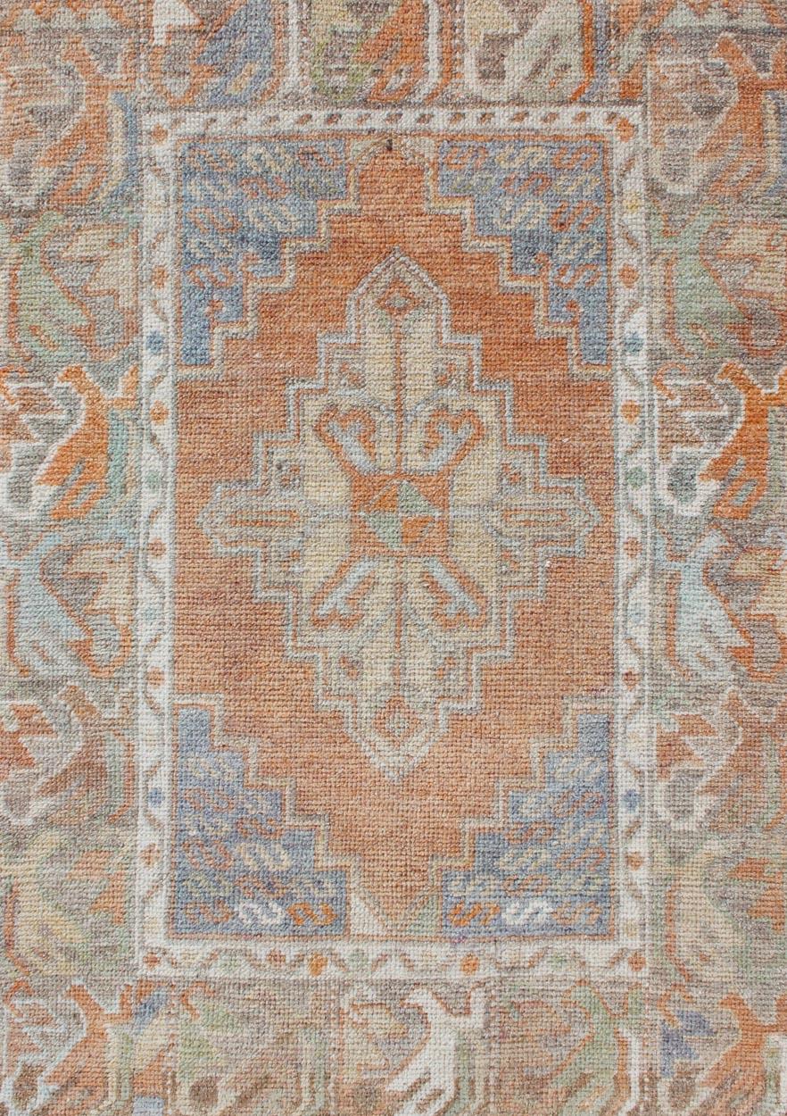 Hand-Knotted Turkish Oushak Vintage Small Carpet in Light Orange and light Blue & L.Green For Sale