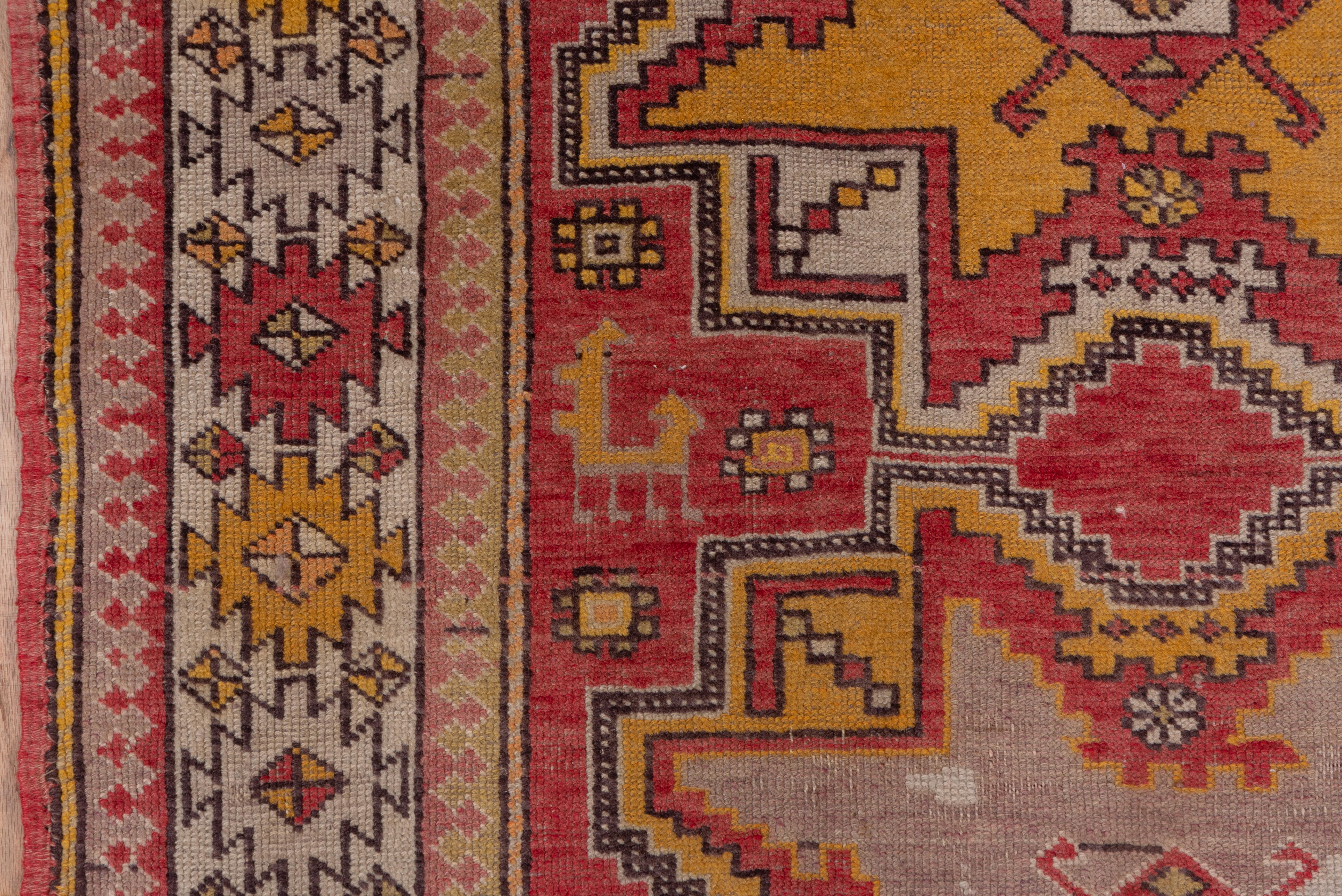 Mid-20th Century Turkish Oushak with Tri Pattern Stars in Various Shades of Orange  For Sale