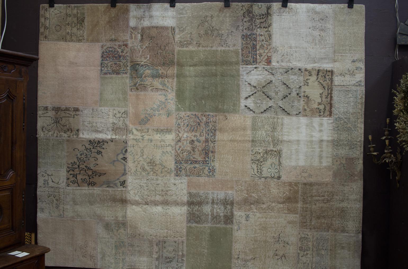 Custom patchwork distressed Turkish carpet made from antique and vintage rugs. It’s a beautiful faded and washed out look of pale colors. Perfect for rustic modern or farmhouse designed homes.
