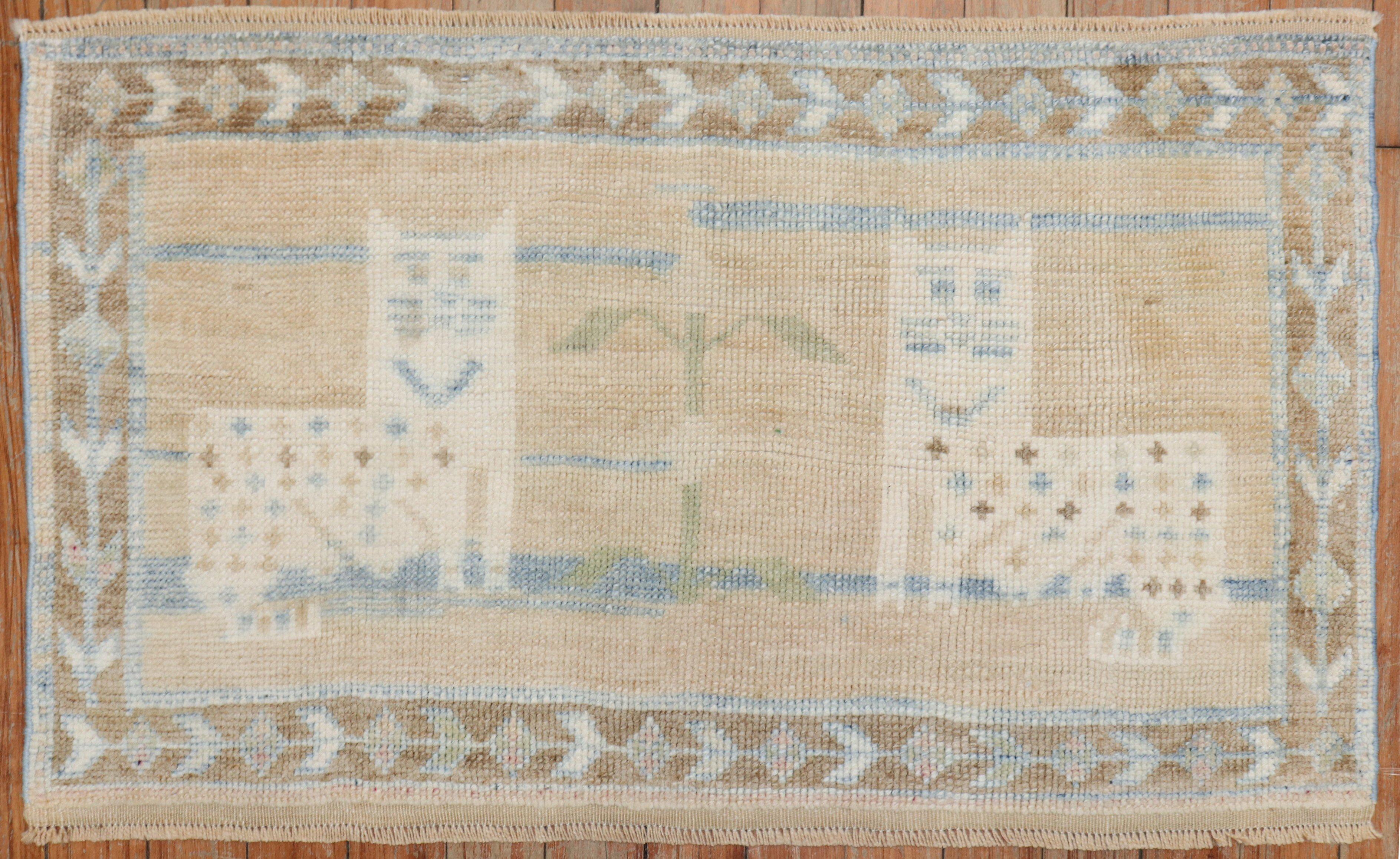 Mid 20th century mini size Turkish pictorial rug.

Measures: 1'8'' x 2'7''.