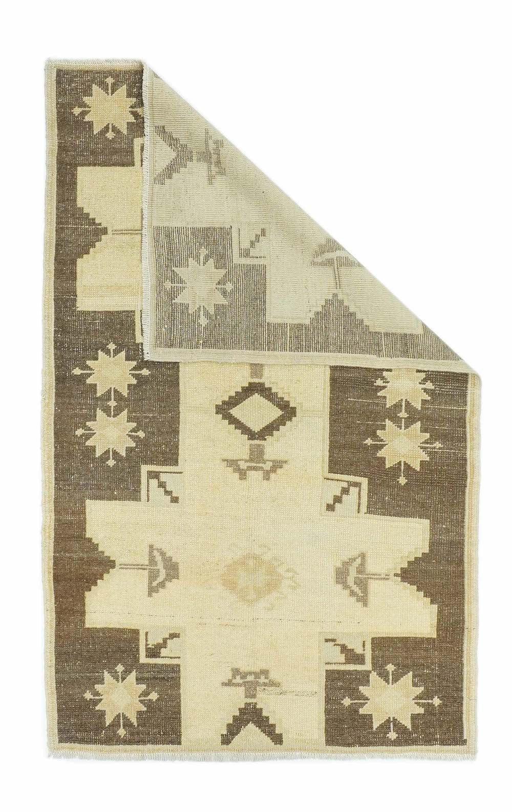 Turkish Rug 3'5'' x 5'9''.  In a modified Caucasian style, with two giant conjoint “Lesghi stars” in straw on an abrashed rust-red field. String beige border. Moderate weave. Light overall wear. Cotton warp. Fairly good condition.