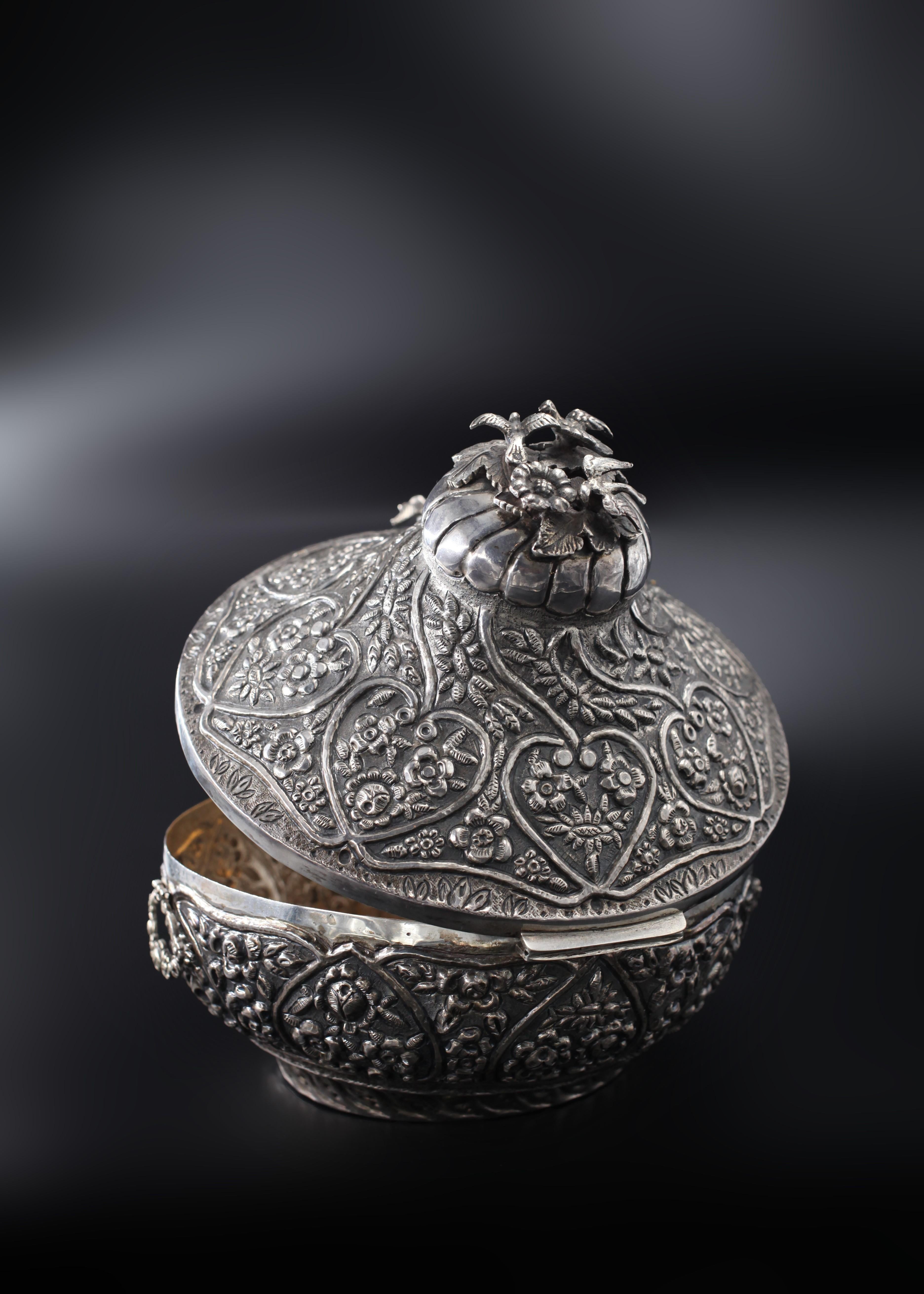 One can get lost in the endless details within this piece's chiseled and embossed detailing. Each of the features on this Turkish Silver Wedding Box is like a mini vignette, displaying the remarkable craftsmanship of silversmiths during the Ottoman