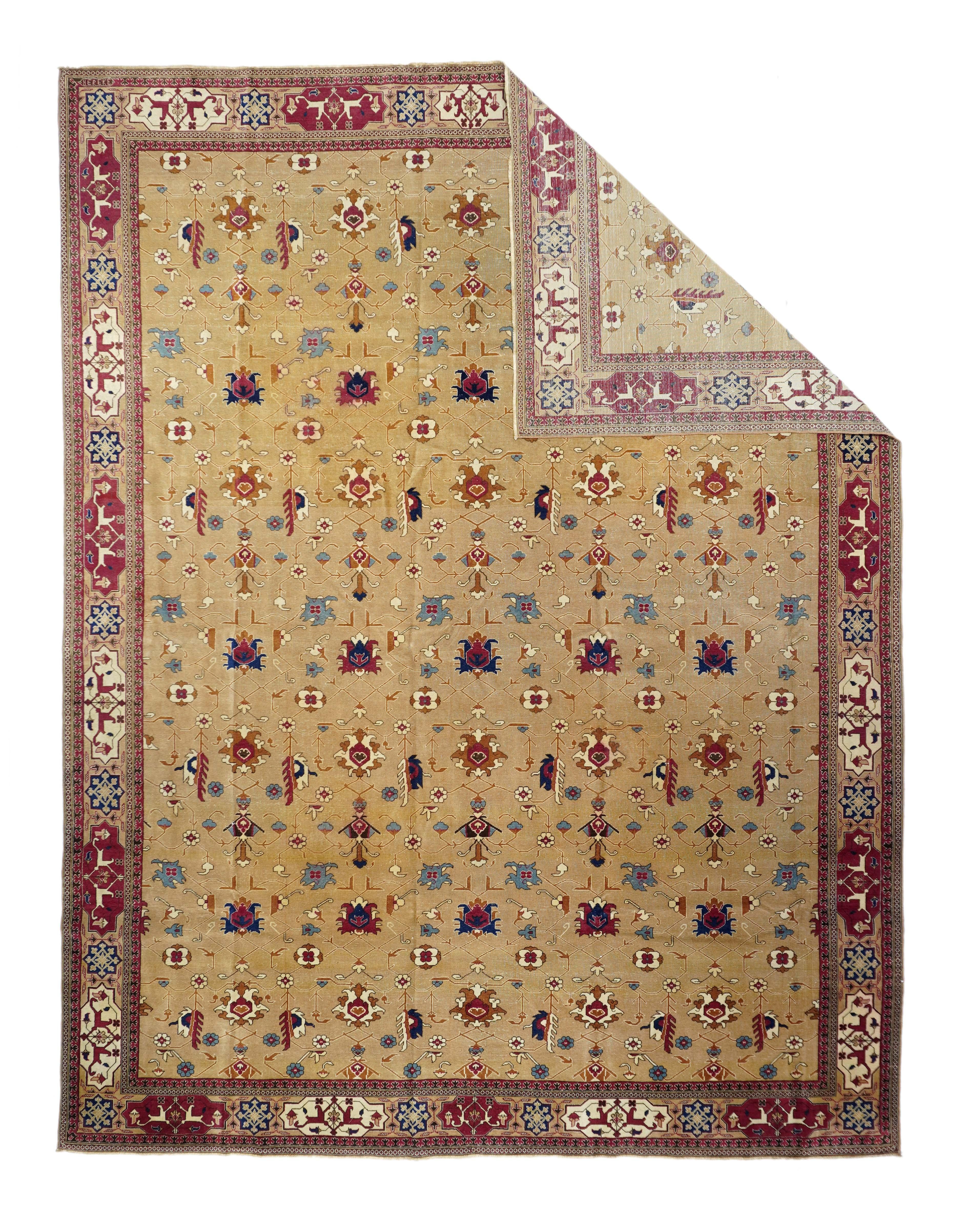 This eastern Anatolian urban roomsize carpet shows a buff field supporting an allover, directional design with an intermittent layout of disjoint petal palmettes in a five clolumn, four row arrangement. Leaves and rosettes are equally widely spaced.