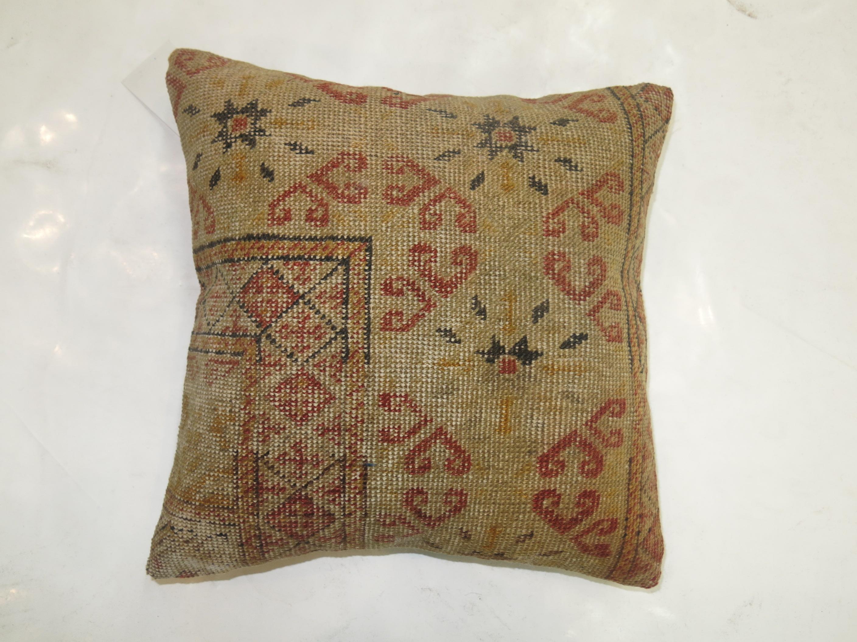Pillow made from an early 20th century turkish rug. poly fill insert provided with a zipper closure
16'' x 16''