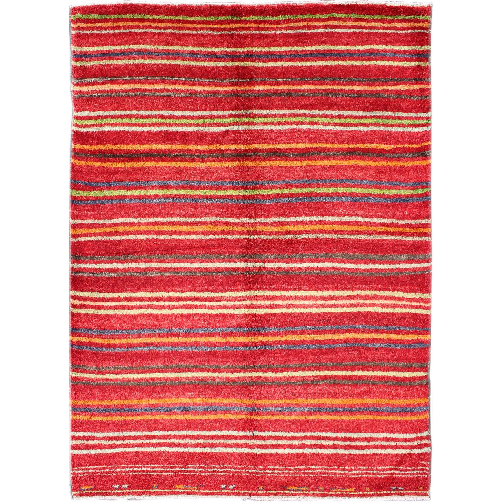 Türkischer Tulu-Teppich mit buntem gestreiftem Muster in Rot, Orange, Blau, Grün