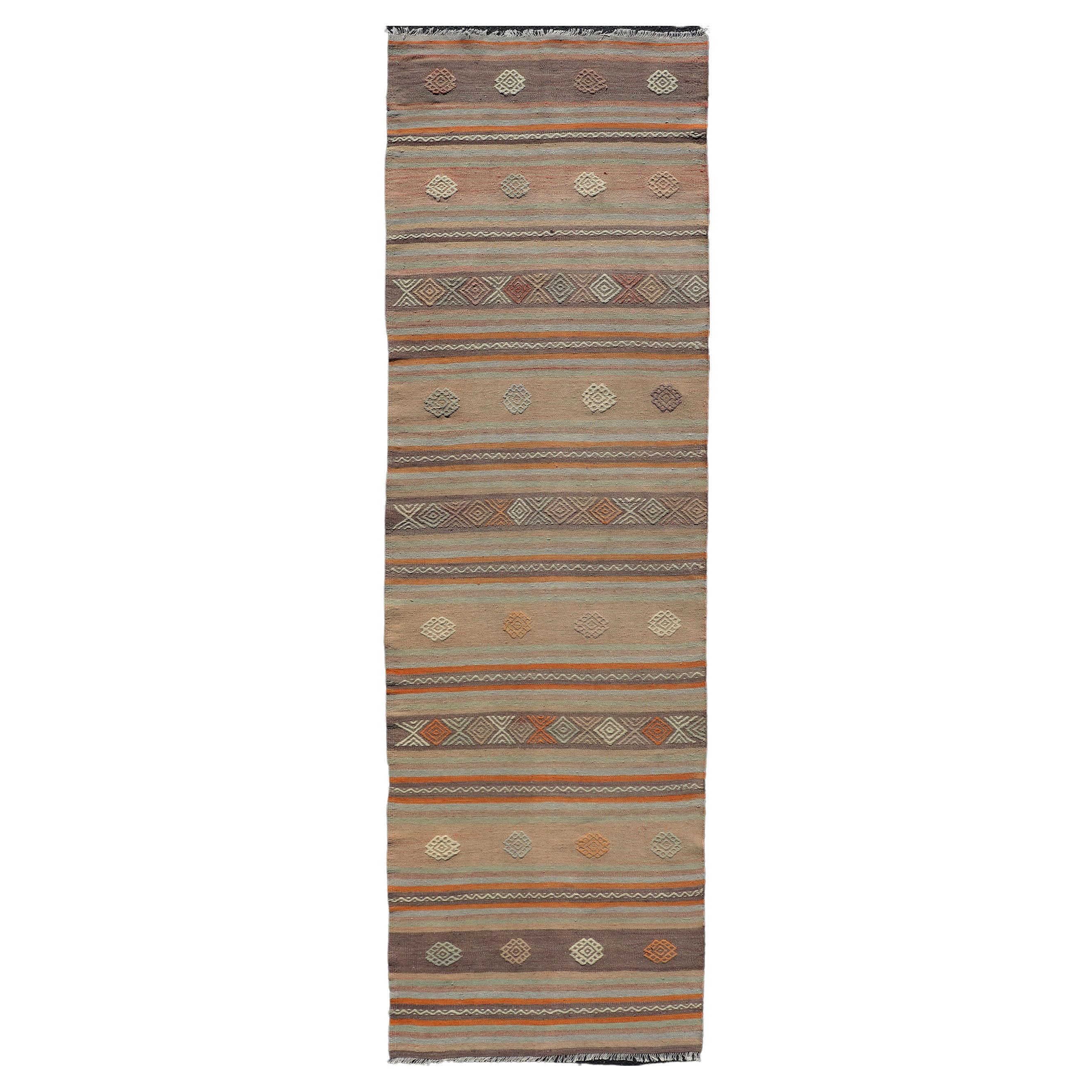 Turkish Vintage Flat-Weave Kilim in Muted Colors with Stripes and Embroideries For Sale