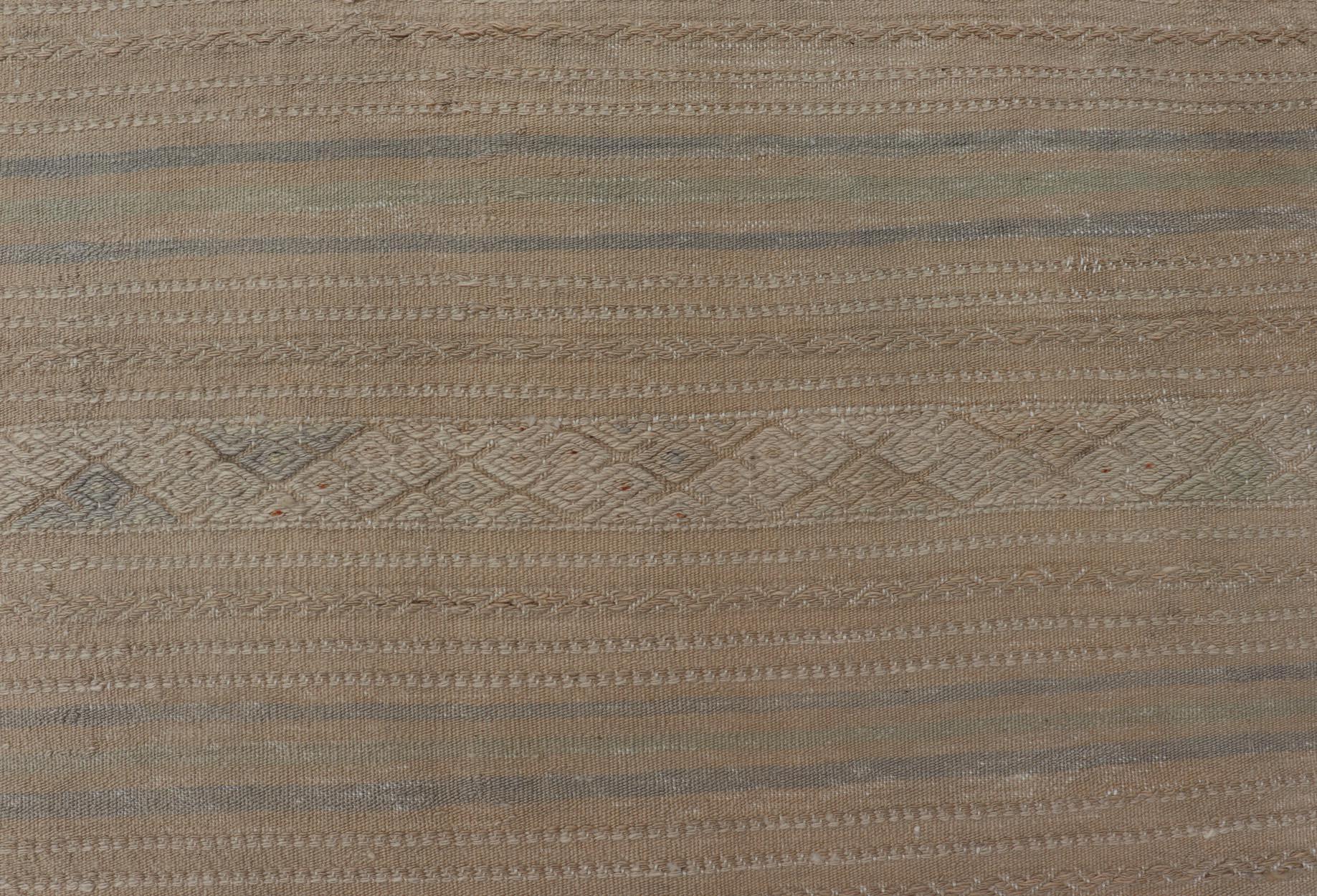  Turkish Vintage Gallery Kilim Rug with in Tan, Taupe, and Earthy Tones. Keivan Woven Arts / rug EN-14139, country of origin / type: Turkey / Kilim, circa 1950

Measures: 6'0 x 10'3
 
Vintage Turkish Kilim minimalist stripe design Kilim from Turkey.
