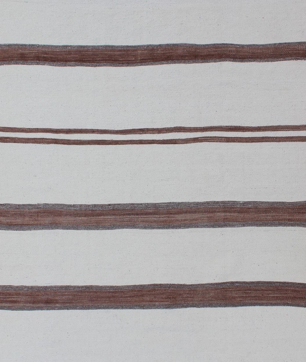 Square size Turkish Vintage Kilim Flat-Weave Rug in Brown and off white with Stripe Design. Keivan Woven Arts / rug EN-179669, country of origin / type: Turkey / Kilim, circa 1950

Measures: 4'2 x 4'7
 
This vintage striped design Turkish Kilim