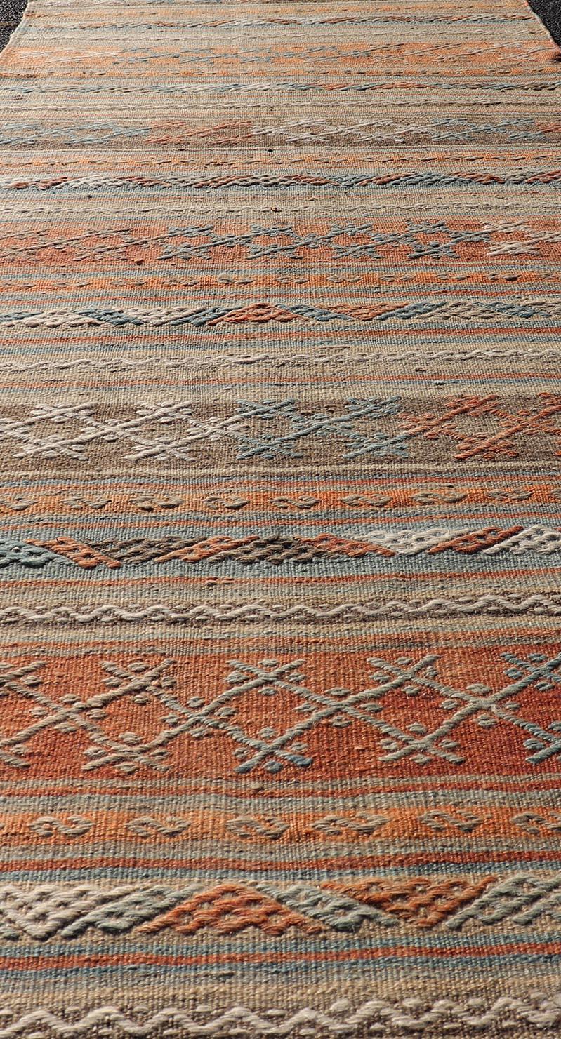 Measures: 2'10 x 9'8 

Turkish Vintage Kilim runner with horizontal stripes and tribal motifs in bright tones.  Turkish Vintage Kilim Runner. 
Hand woven Vintage Turkish Kilim in colors with hand woven motifs with stripes, Keivan Woven Arts/rug