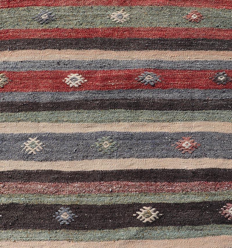 Wool Turkish Vintage Kilim Striped Runner with Tribal Motifs in Copper and Greens  For Sale