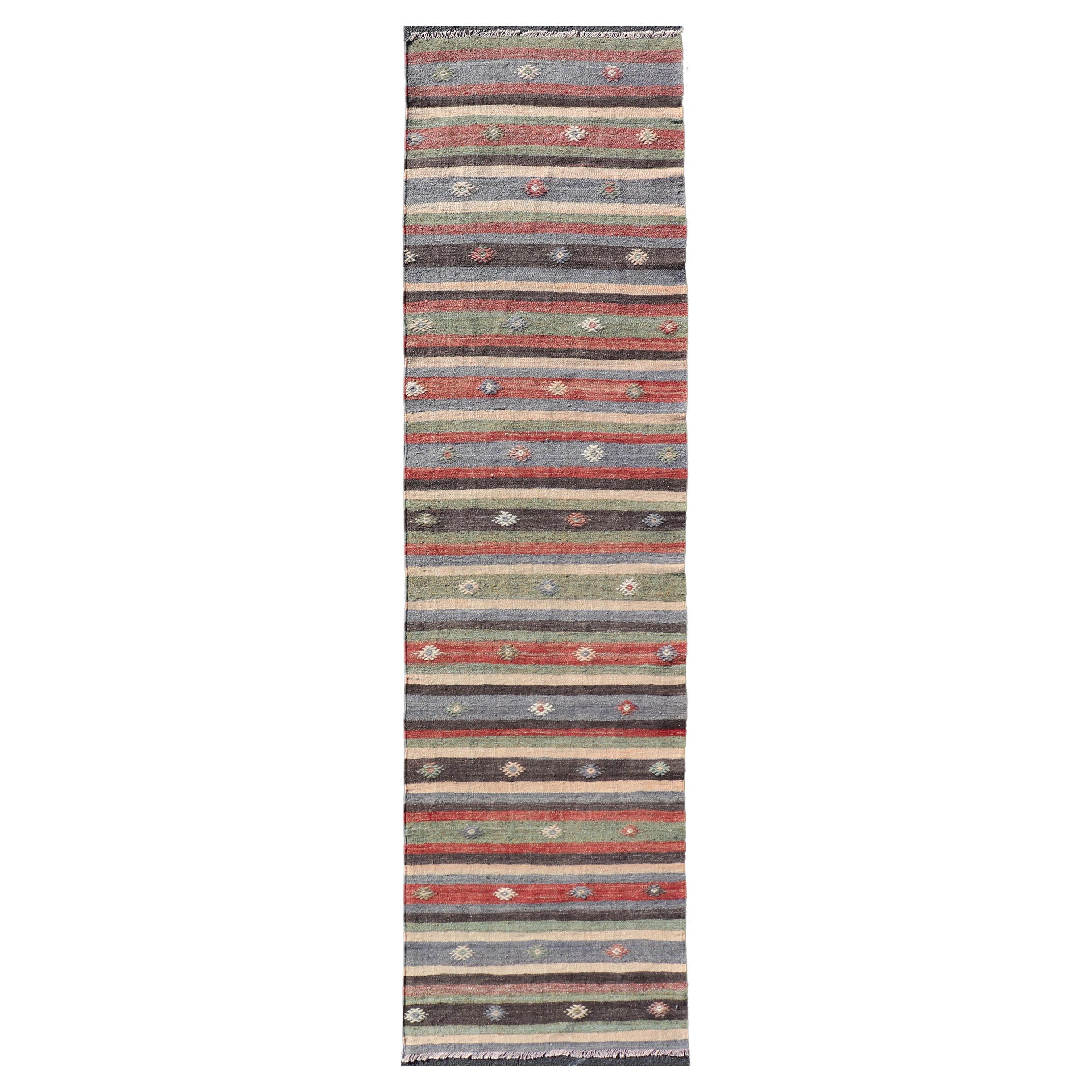 Turkish Vintage Kilim Striped Runner with Tribal Motifs in Copper and Greens  For Sale