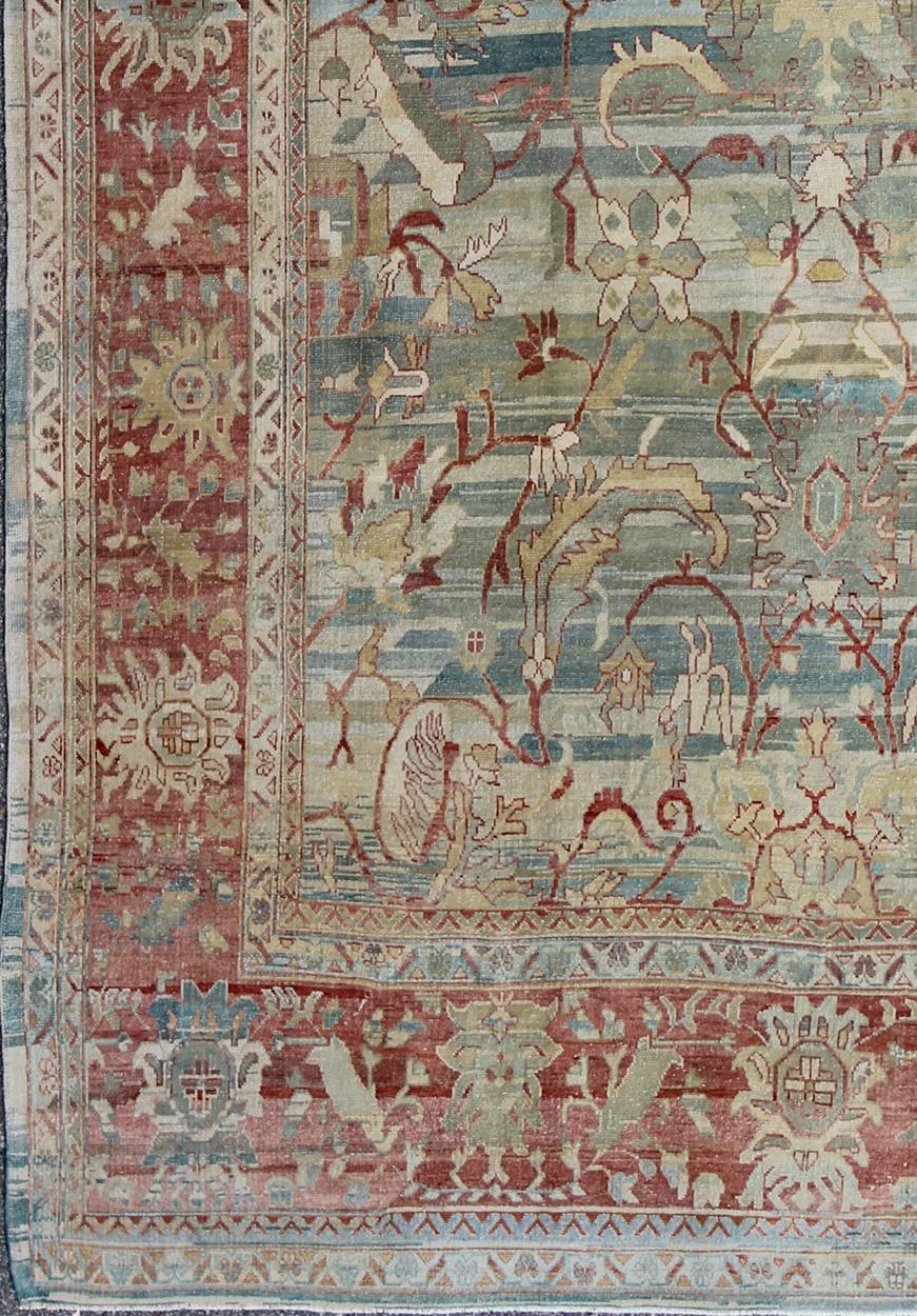 Hand-Knotted Turkish Vintage Oushak Rug with All over Design in Variegated Background For Sale