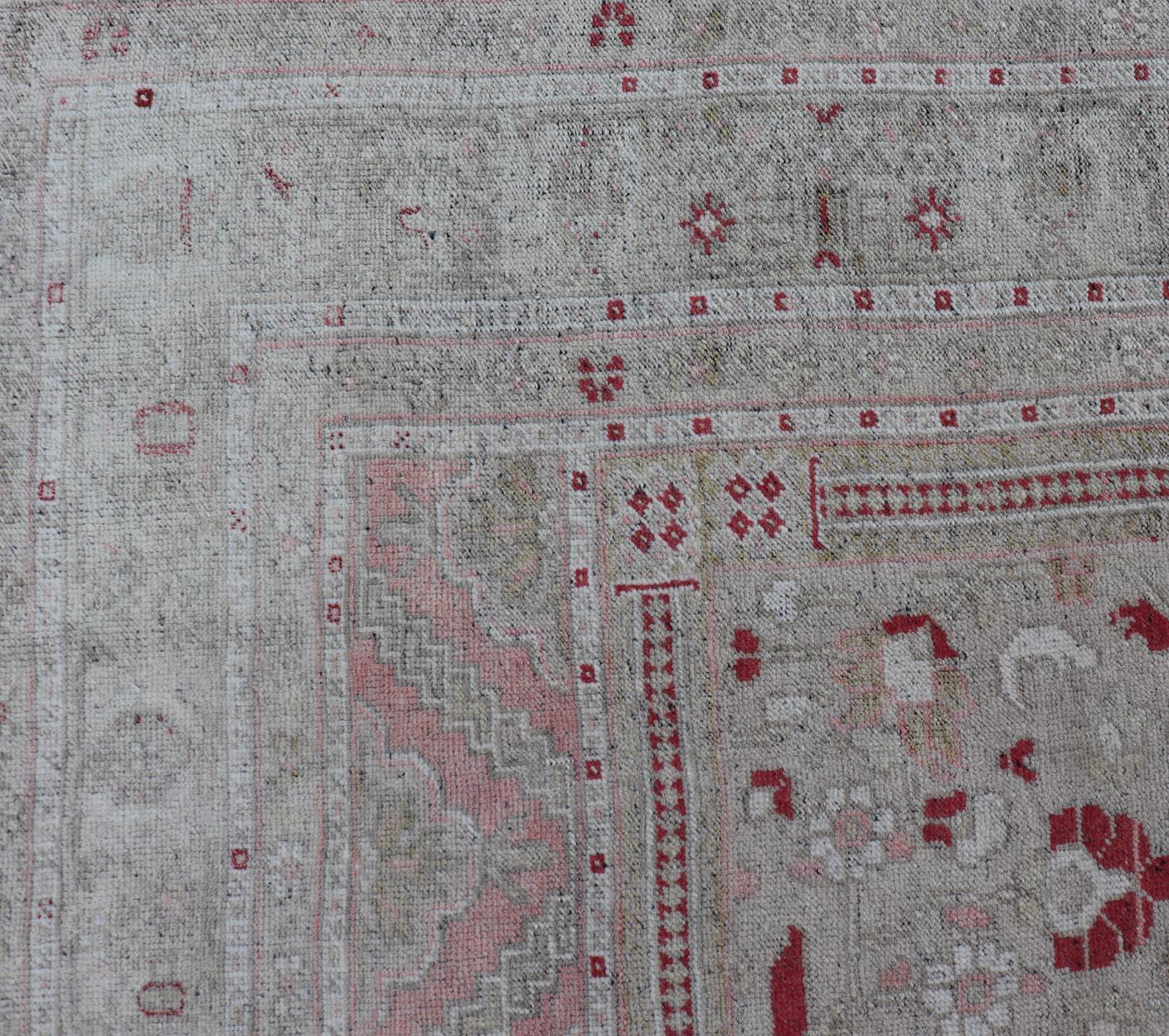 Hand-Knotted Turkish Vintage Oushak Rug with Geometric Design With A Soft Coral Color For Sale