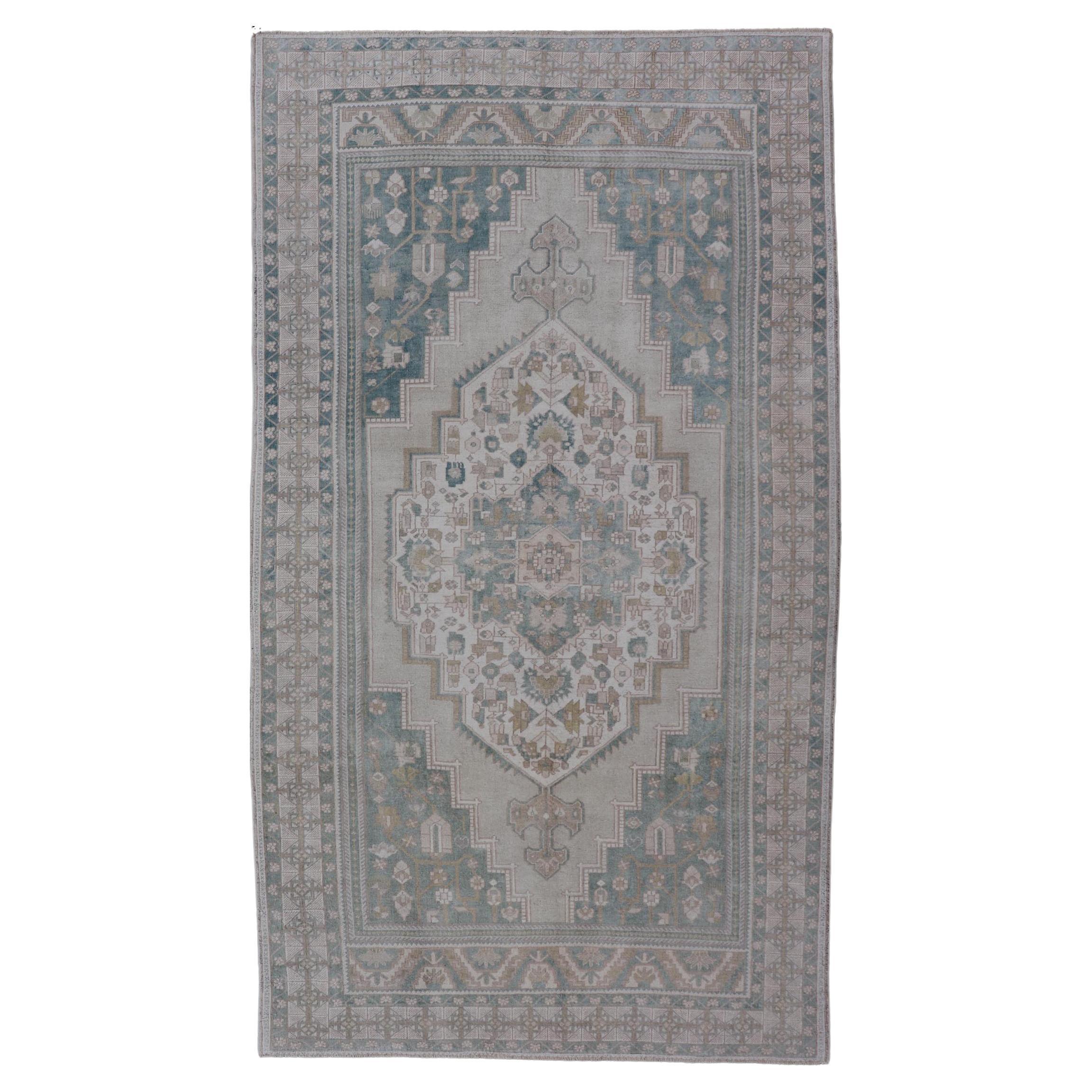Turkish Vintage Oushak Rug With Medallion in Muted Light Green and Cream For Sale