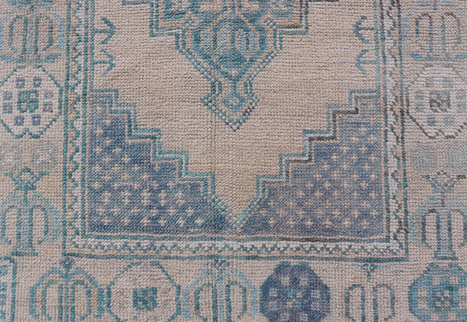 Hand-Knotted Turkish Vintage Oushak Runner with Geometric Medallion Design in Blues and Beige For Sale