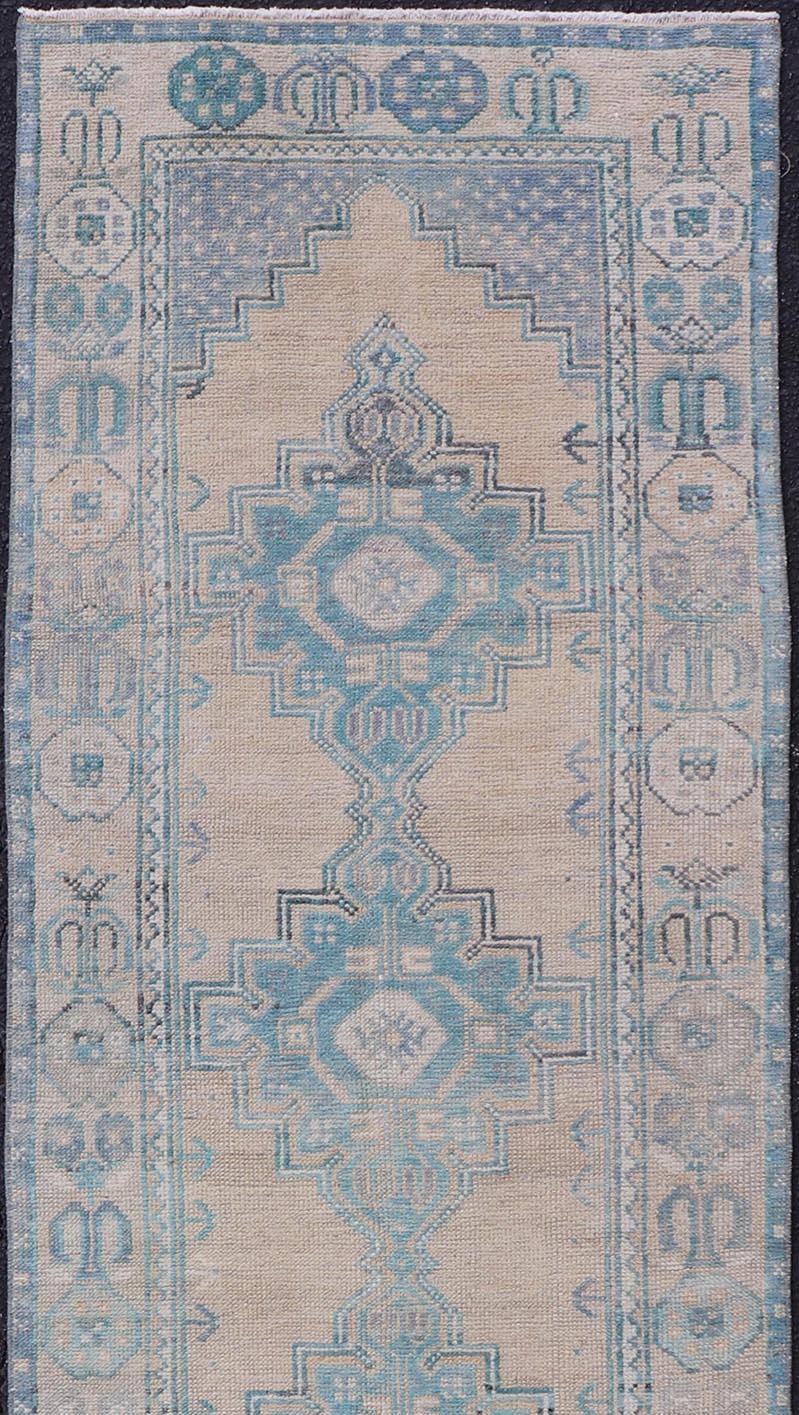 20th Century Turkish Vintage Oushak Runner with Geometric Medallion Design in Blues and Beige For Sale