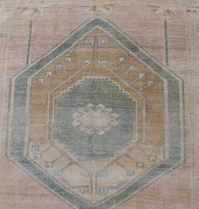Measures: 3'6 x 12'6 
Turkish Vintage Oushak Runner With Medallions and Soft Pastel Colors 3'6 x 12'6.  Keivan Woven Arts / Rug / EN-15887 Country of origin / type: Turkey / Oushak. 
Turkish Vintage Oushak Runner beautifully captures the essence of