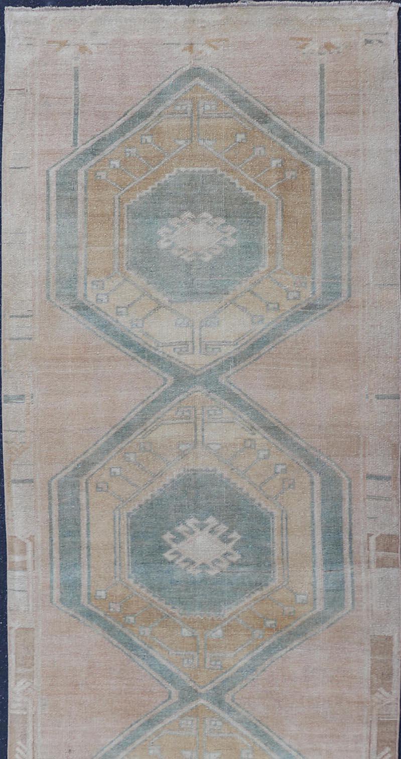20th Century Turkish Vintage Oushak Runner With Medallions and Soft Pastel Colors 3'6 x 12'6 For Sale