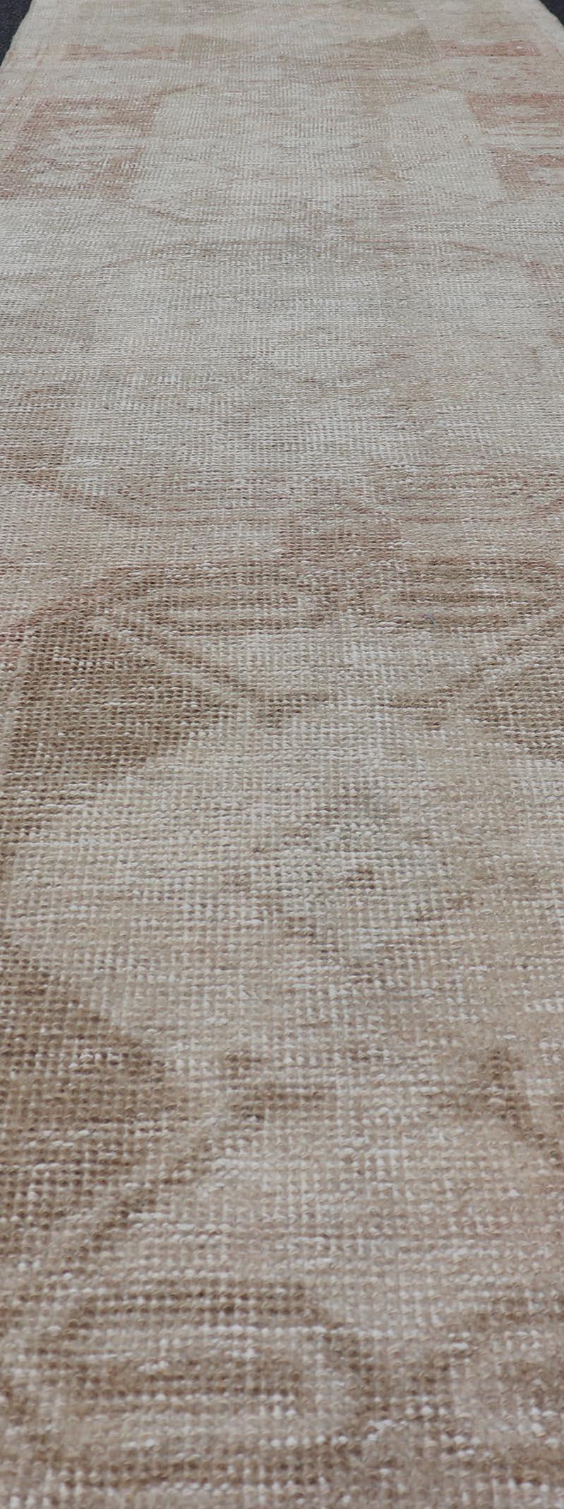 Measures: 2'7 x 11'4
 Turkish Vintage Oushak Runner With Muted Geometric Medallions 2'7