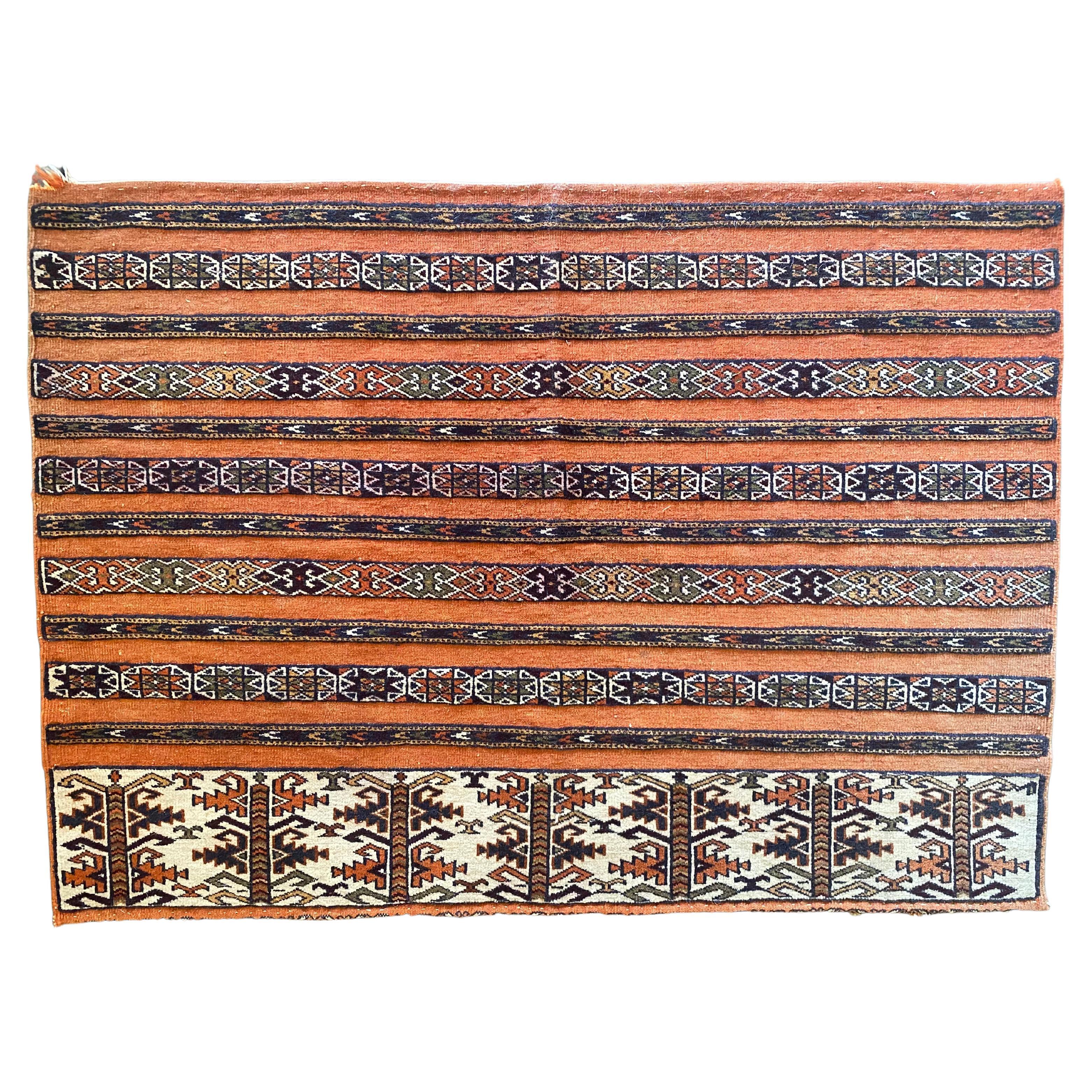 Alfombra tribal Yomud de Turkmenistán, principios del siglo XX